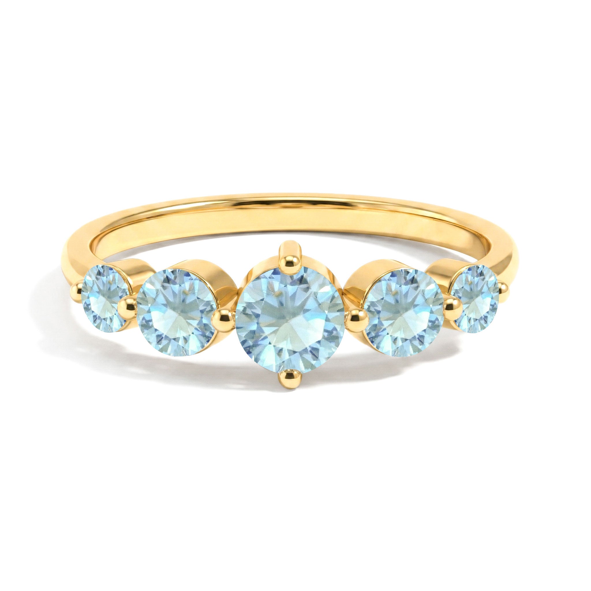 graduated aquamarine jewelry, five stone luxury ring, handcrafted sterling silver accessory, premium yellow gold filled finish, polished elegant band, sparkling round blue gemstones, artisan crafted design, women's timeless jewelry, anniversary celebration ring, stackable fashion accessory, refined gemstone brilliance, comfortable everyday wear, classic fine jewelry, sophisticated elegance, designer gemstone ring