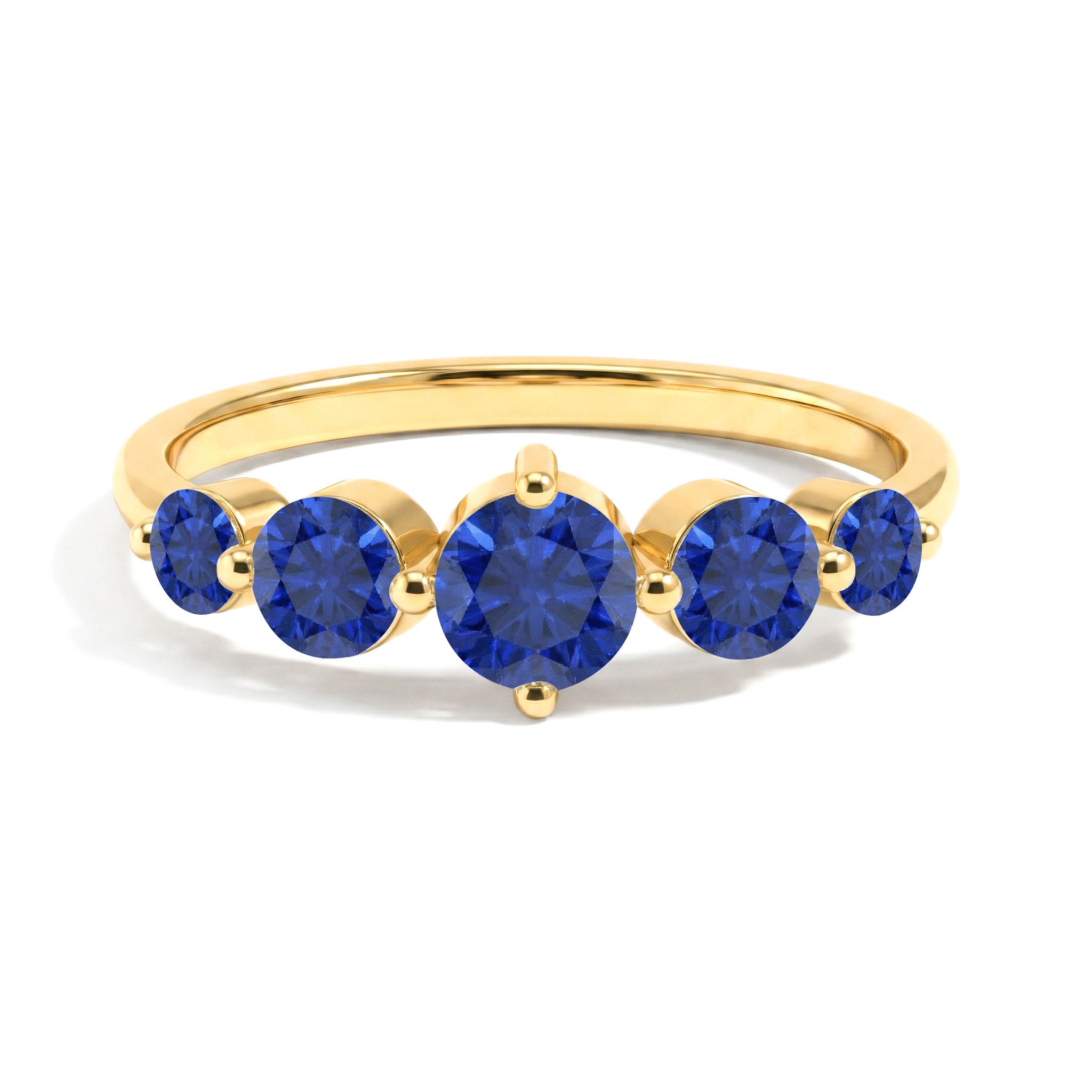 blue sapphire wedding style ring, elegant fine accessory, graduated gemstone band, luxury artisan jewelry, sparkling royal blue stones, classic women's design, premium sapphire craftsmanship, stylish anniversary jewelry, everyday elegance, sophisticated gemstone fashion, timeless ring collection, refined statement accessory, beautiful stacking ring, polished finish, meaningful keepsake