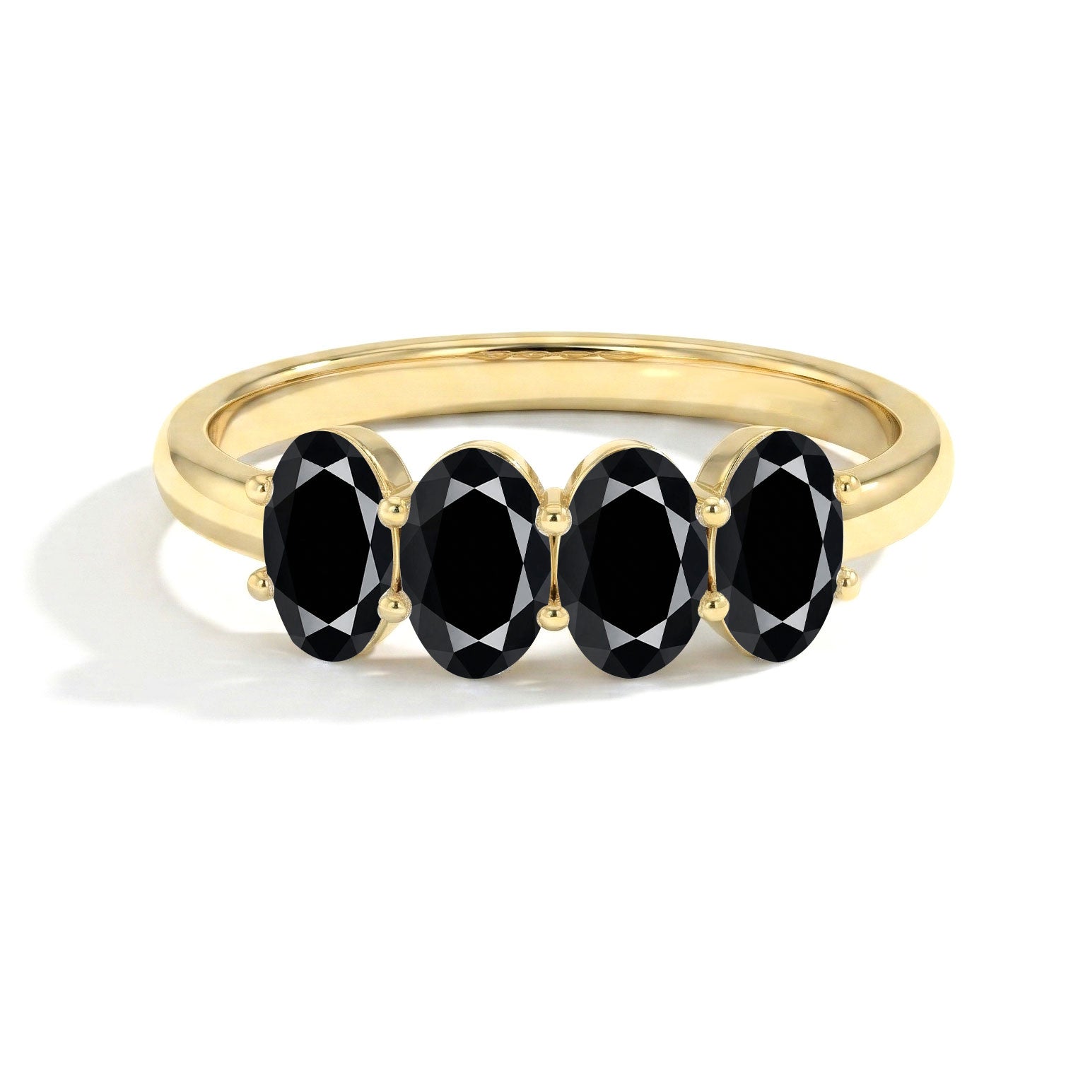 black onyx jewelry, oval gemstone ring, four gemstone ring, sleek black ring, fine jewelry, dainty ring, contemporary ring, women's gemstone ring, everyday jewelry, artisan ring