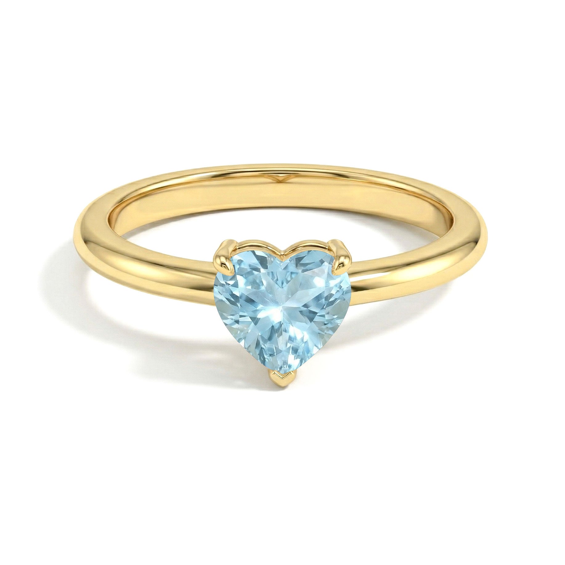 Blue aquamarine heart jewelry, classic solitaire gemstone ring, minimalist women's accessory, March birthstone ring, polished metal jewelry, elegant promise jewelry, engagement inspired design, luxury craftsmanship, dainty fashion ring, anniversary present, birthday jewelry, romantic gift, timeless gemstone, fine accessory, everyday luxury