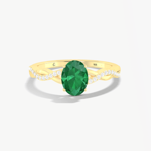 Green Dainty oval shape Emerald In Prong sett Gold ring