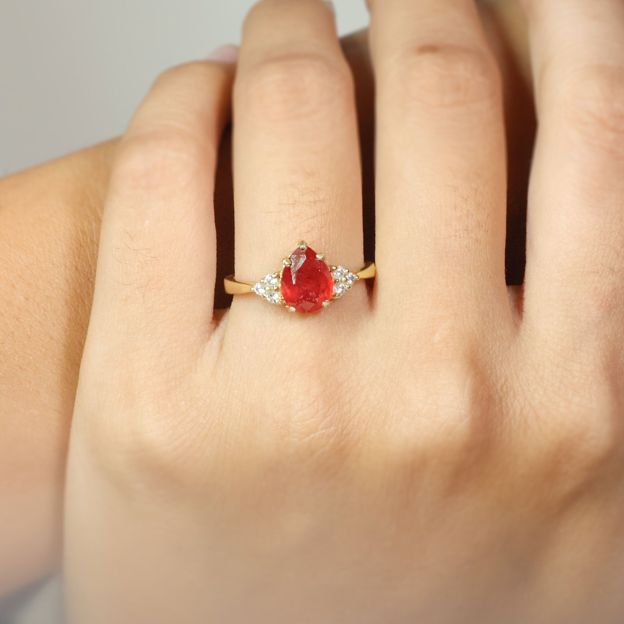 Natural Ruby Pear Shape & White Zircon Solitaire with Accents Ring - Goodstone Jewels