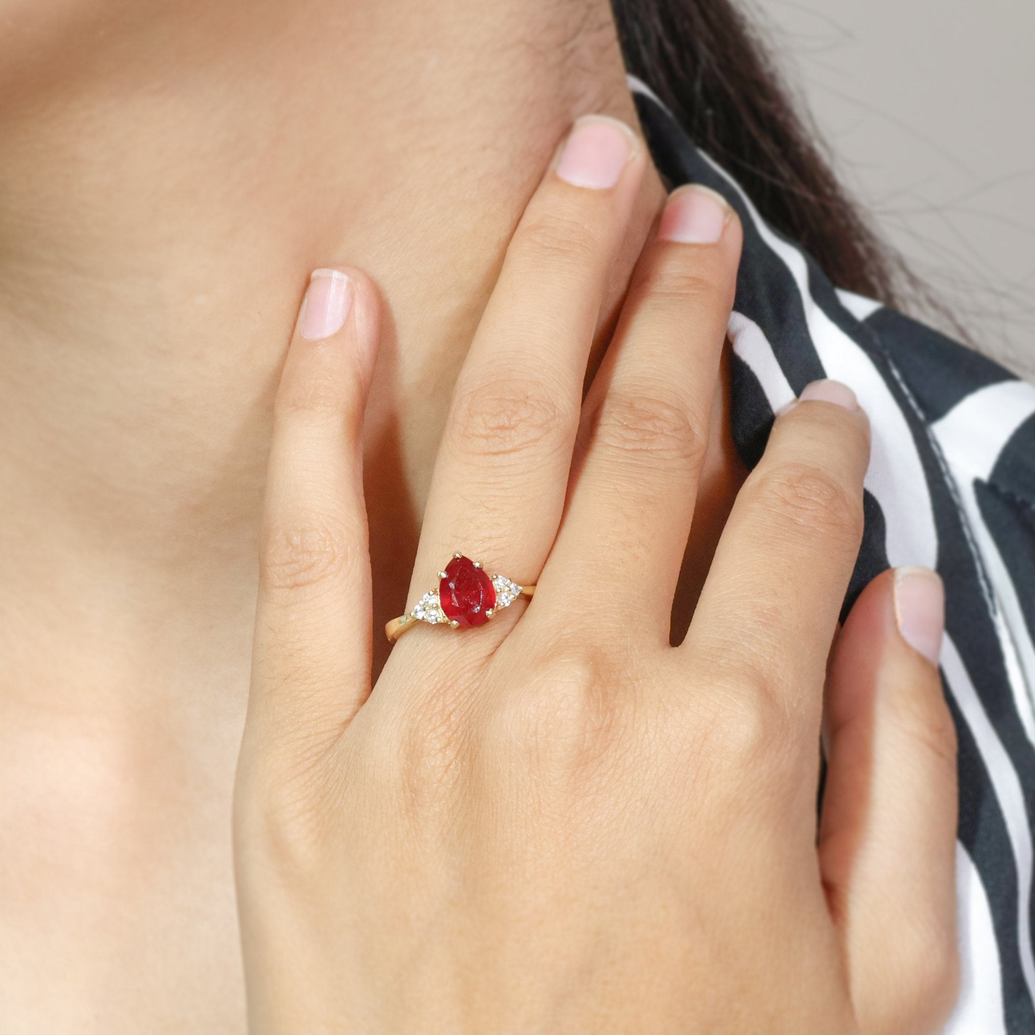 Natural Ruby Pear Shape & White Zircon Solitaire with Accents Ring - Goodstone Jewels