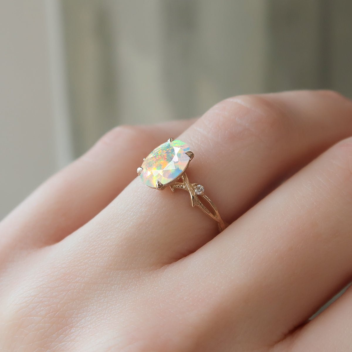 Natural White Opal with Side Stone Crossover Solitaire Ring - Goodstone Jewels