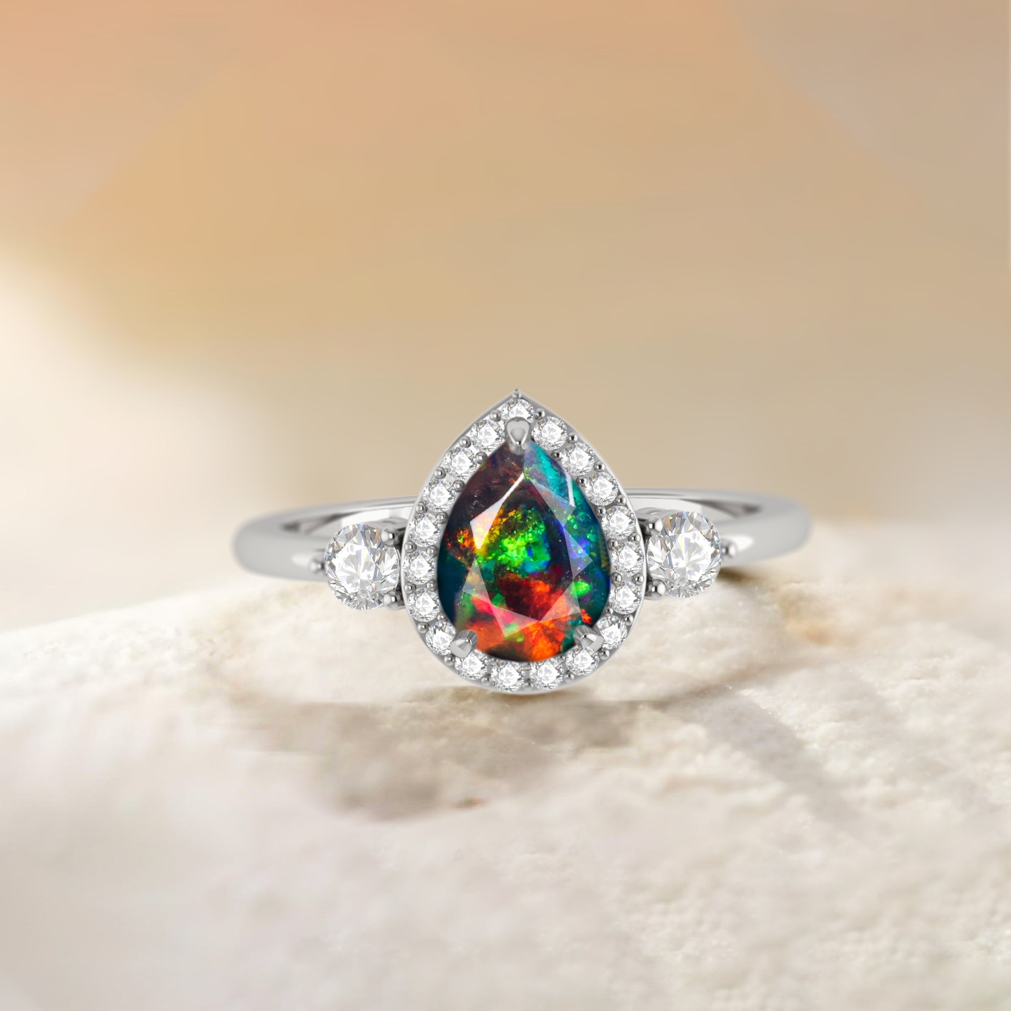 Pear Shape Faceted Natural Black Opal Halo Ring - Goodstone Jewels