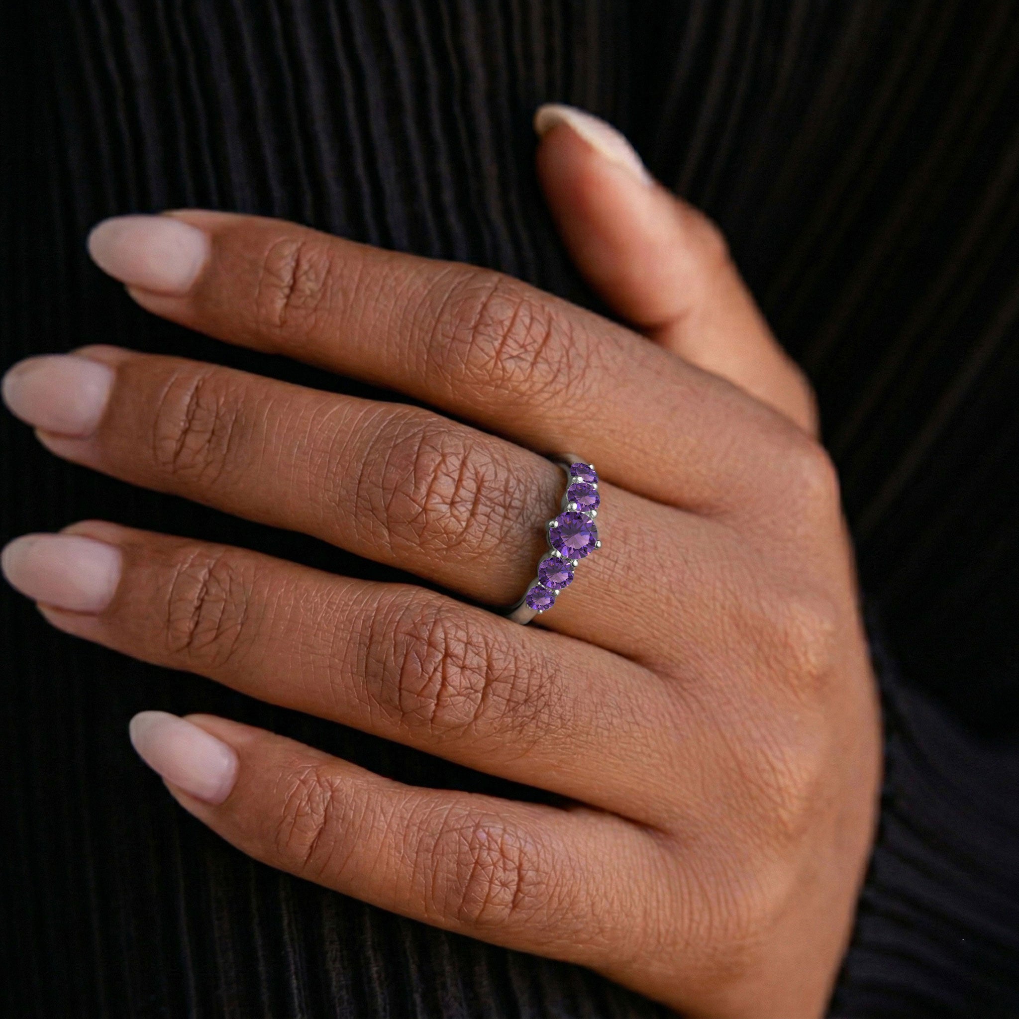 five stone amethyst band, natural round purple gemstones, sterling silver gemstone jewelry, gold filled ring design, handcrafted birthstone accessory, faceted amethyst sparkle, women's fashion ring, elegant gift jewelry, polished metal finish, timeless gemstone band, luxury artisan craftsmanship, February birthstone ring, fine jewelry collection, sophisticated stacking ring, durable everyday accessory
