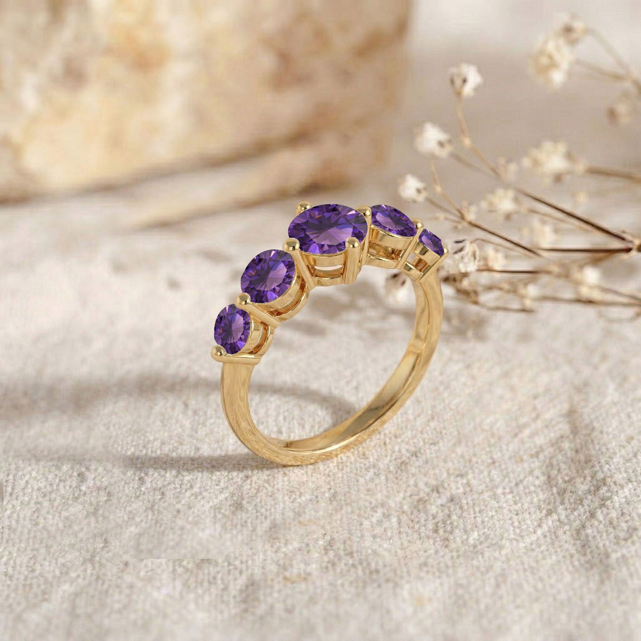 natural amethyst fashion ring, five round gemstone arrangement, premium handcrafted jewelry, sterling silver polished band, gold filled elegant ring, February gemstone gift, artisan luxury craftsmanship, women's statement accessory, sparkling violet gemstones, refined classic style, comfortable stackable ring, anniversary jewelry idea, everyday elegance accessory, timeless gemstone design, fine handmade jewelry