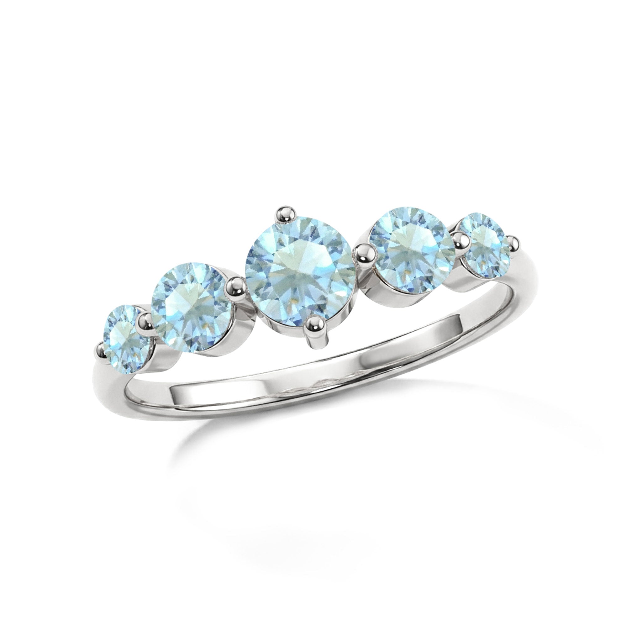 ocean blue gemstone ring, five round aquamarine stones, handcrafted artisan band, sterling silver polished jewelry, premium gold filled ring, elegant statement accessory, sparkling gemstone brilliance, women's anniversary jewelry, refined fashion design, comfortable stackable ring, timeless keepsake accessory, sophisticated handcrafted elegance, luxury jewelry collection, brilliant gemstone setting, modern ring design