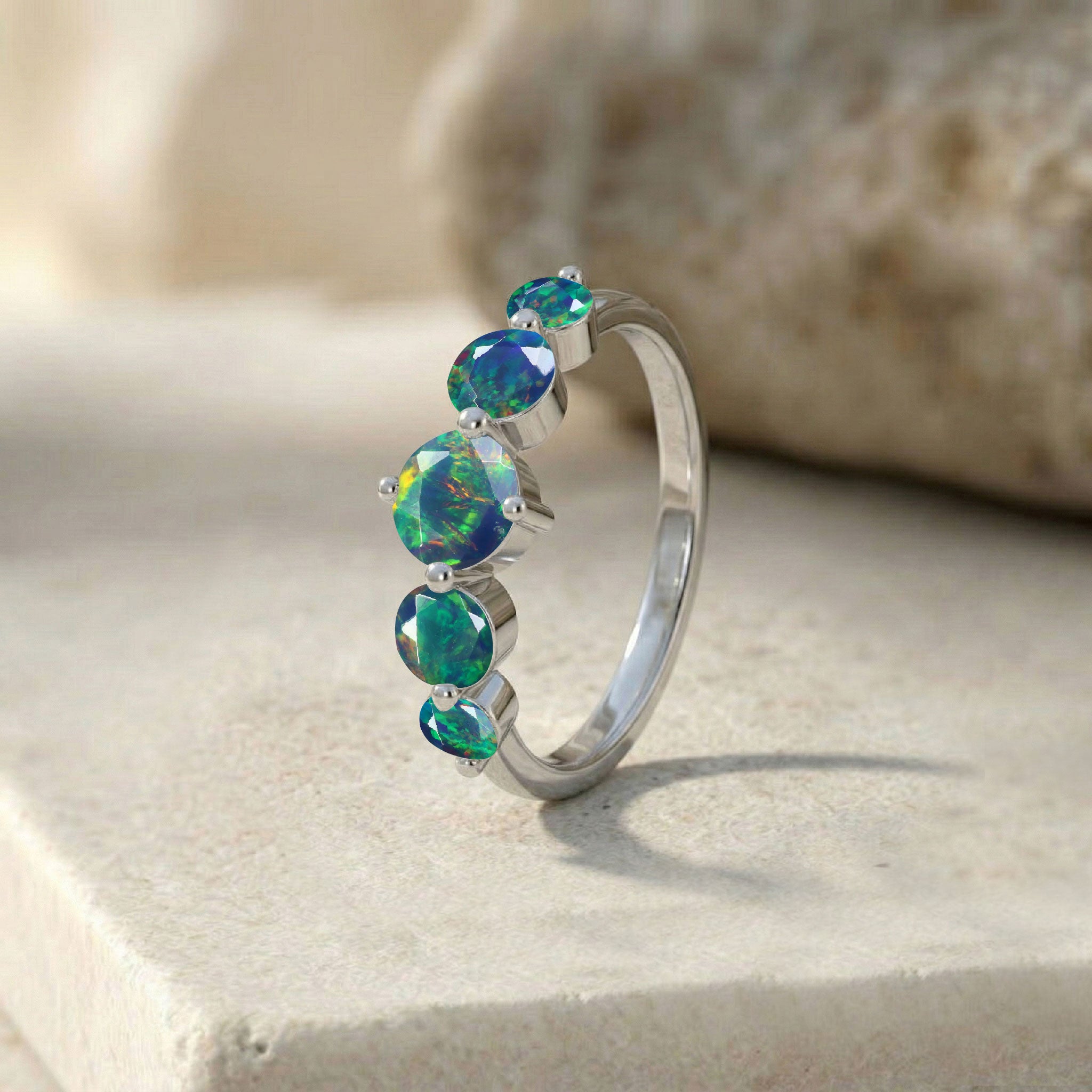five stone opal band, natural gemstone jewellery, handcrafted sterling silver ring, polished gold filled craftsmanship, vibrant opal colour play, elegant anniversary ring, artisan gemstone design, premium fashion jewellery, comfortable ring fit, refined craftsmanship, luxury accessory, timeless gemstone collection, women's statement ring, exclusive design, fine jewellery