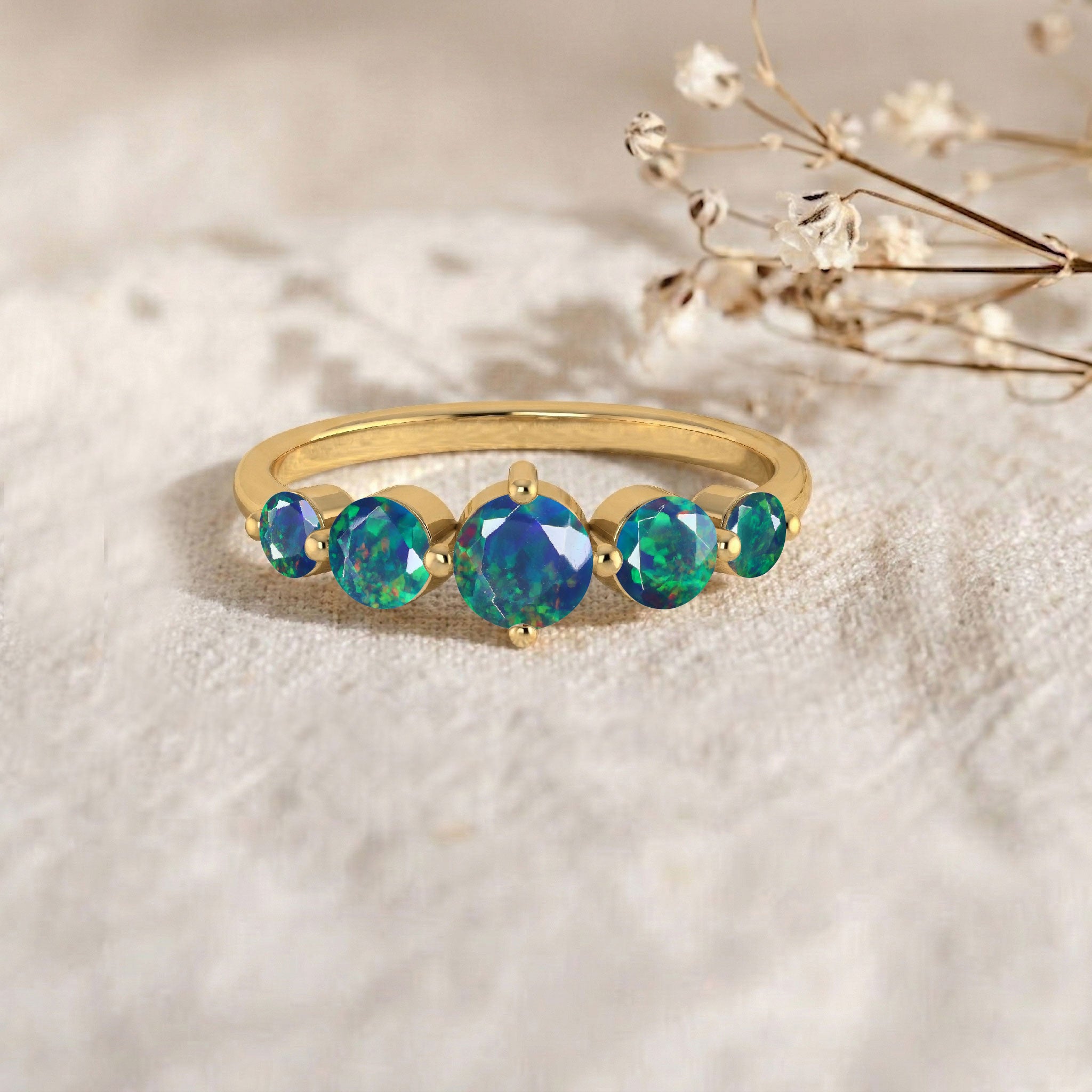 October birthstone ring, natural black opal gemstones, round opal jewellery, luxury sterling silver ring, yellow gold filled jewellery, handcrafted artisan craftsmanship, vibrant gemstone flashes, elegant stacking ring, polished comfort fit, sophisticated jewellery collection, premium fashion accessory, timeless elegance, colourful gemstone band, women's jewellery, luxury design