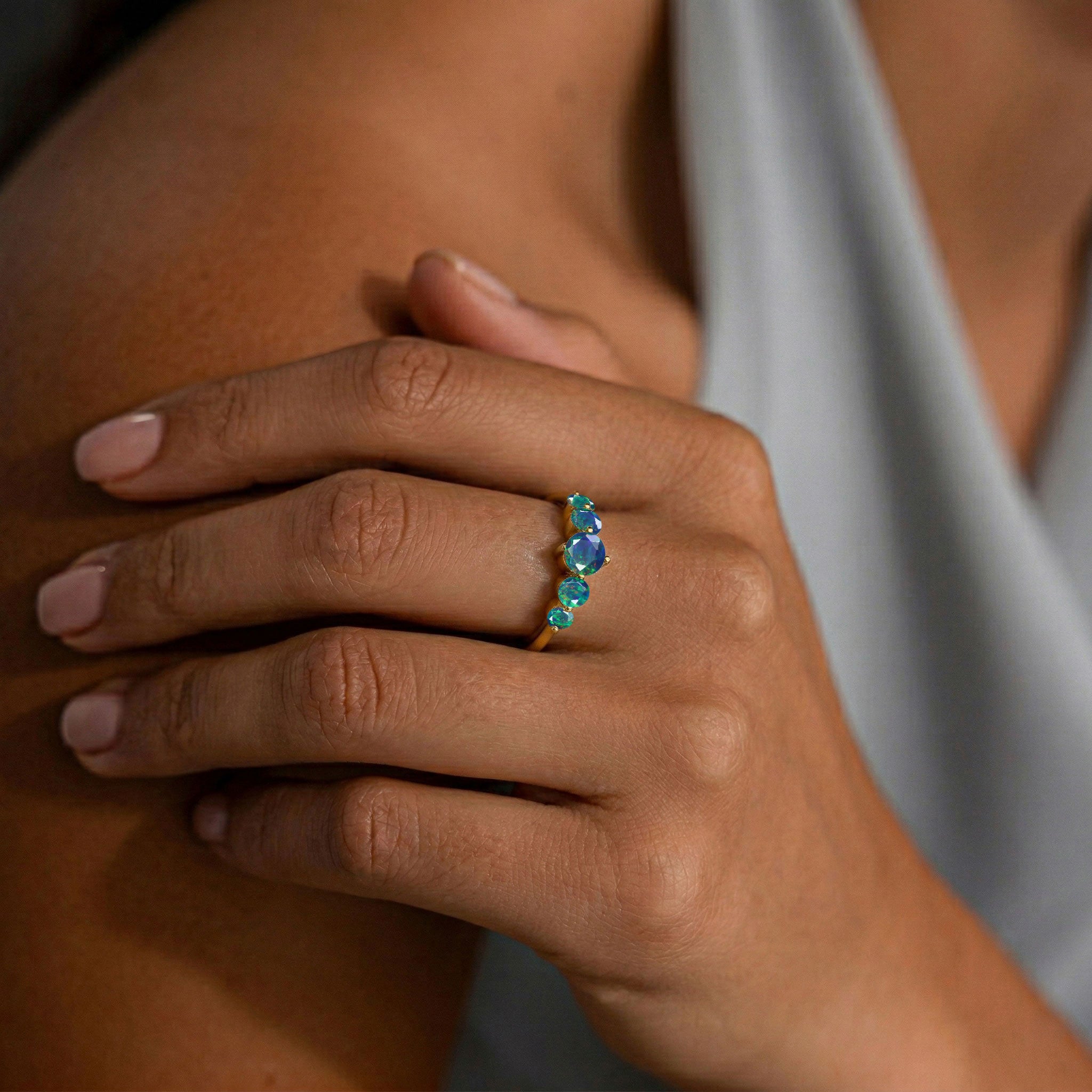 round black opal stones, handcrafted gemstone arrangement, sterling silver jewellery, yellow gold filled luxury, polished elegant band, artisan jewellery craftsmanship, October birthstone fashion, premium gemstone brilliance, refined jewellery styling, colourful statement ring, women's elegant accessory, timeless collection, handcrafted beauty, luxury jewellery, sophisticated design