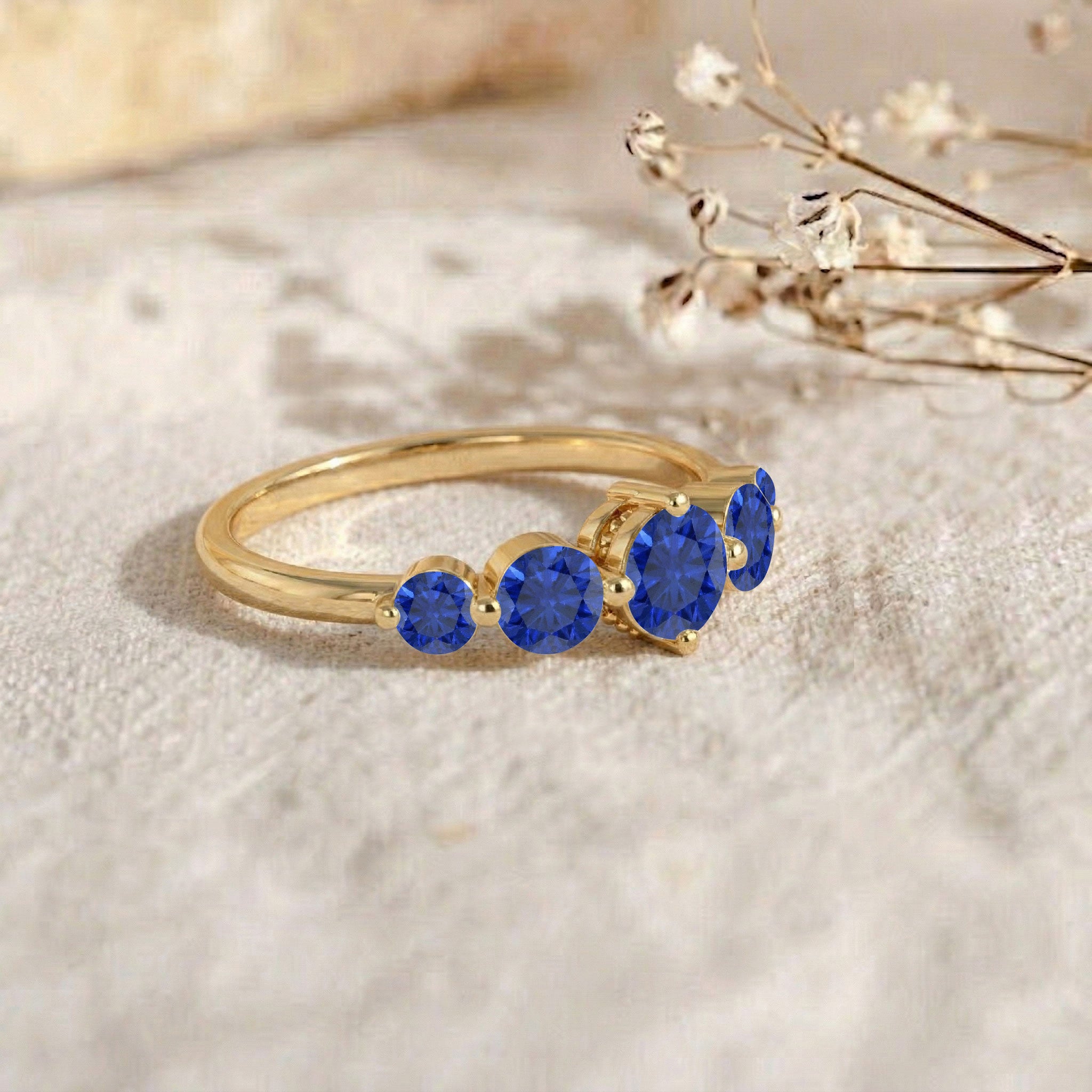 graduated sapphire ring, blue crystal appearance, elegant women's band, timeless jewelry design, artisan crafted ring, anniversary keepsake, sapphire engagement style, delicate gemstone band, brilliant royal blue stones, fine fashion jewelry, luxurious accessory, premium quality ring, elegant stacking style, sophisticated look, stylish gift