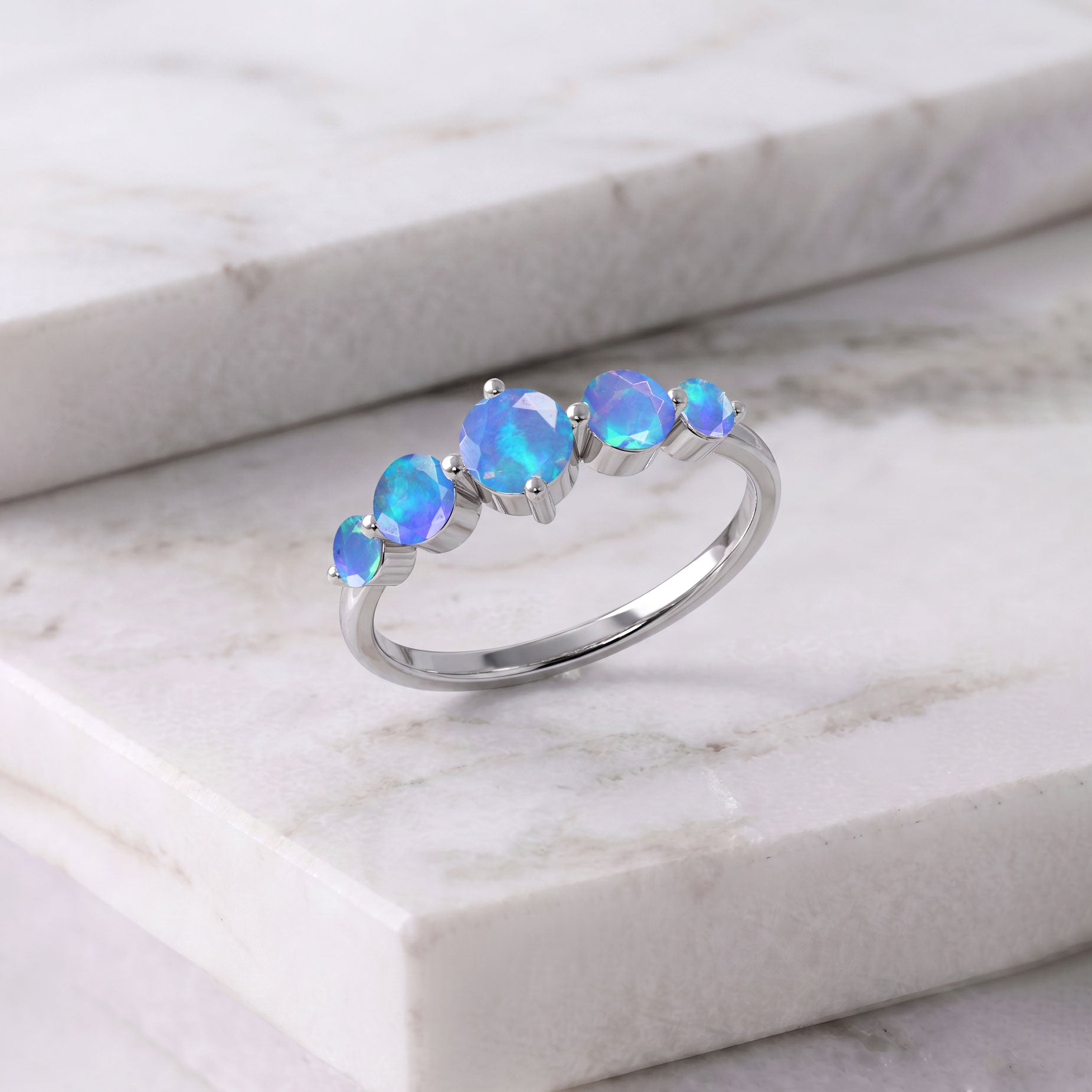 natural blue opal fine jewelry, handcrafted gemstone ring, sterling silver artisan jewelry, yellow gold filled elegant ring, vibrant gemstone design, luxury women's ring, polished handcrafted accessory, classic five stone jewelry, October birthstone gift, refined stacking ring, premium gemstone setting, timeless fashion jewelry, anniversary present, sophisticated craftsmanship, elegant everyday jewelry