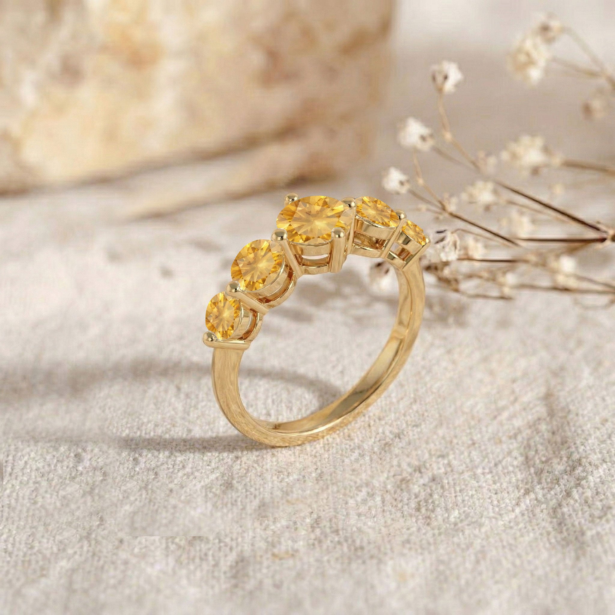 natural honey citrine jewelry, five round gemstone ring, handcrafted artisan accessory, sterling silver polished band, premium gold filled finish, elegant fine jewelry, radiant yellow gemstone sparkle, women's anniversary jewelry, sophisticated stacking ring, refined gemstone craftsmanship, timeless designer style, comfortable fit, luxury fashion accessory, brilliant gemstone shine, heirloom quality