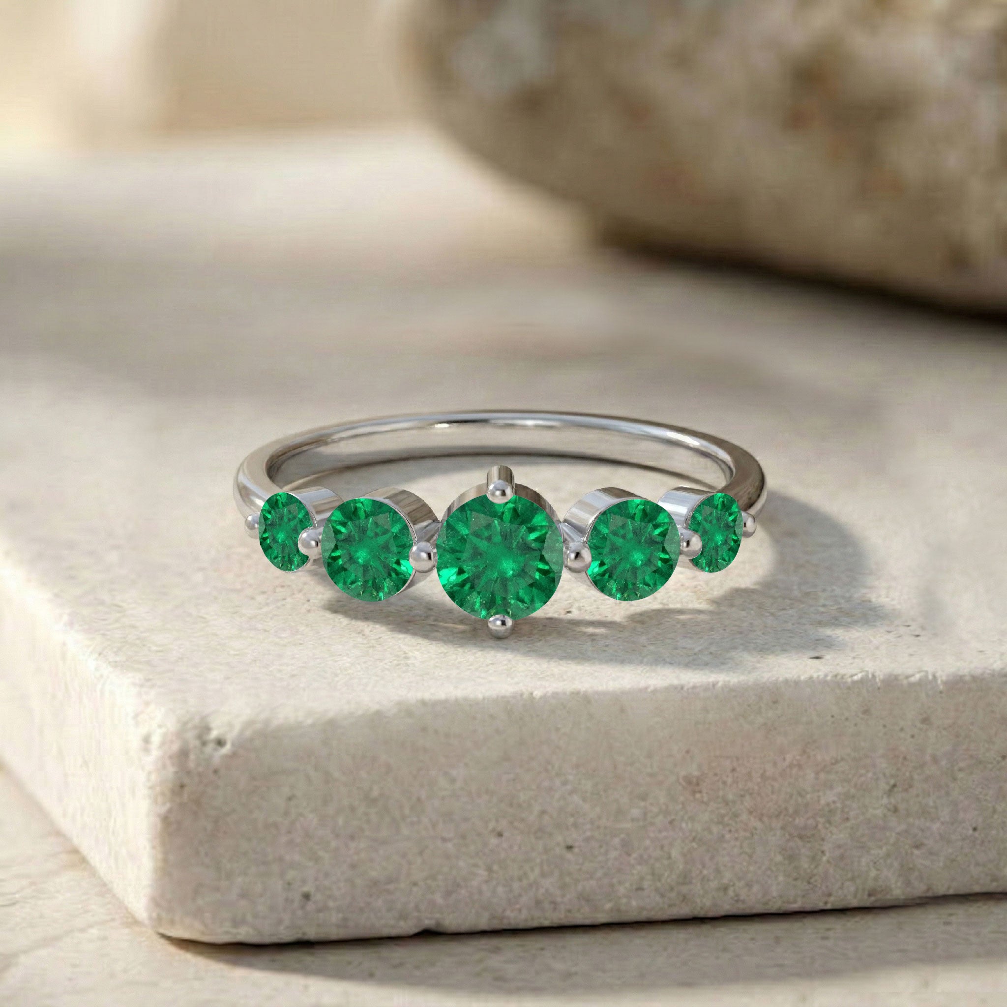 Five round emerald gemstones, emerald eternity style ring, classic emerald band, sterling silver stacking ring, yellow gold filled jewelry, emerald bridal band, refined gemstone jewelry, handcrafted emerald ring, contemporary band design, vivid green gemstone, elegant gift idea, fine jewelry ring, comfortable ring, timeless elegance, premium craftsmanship