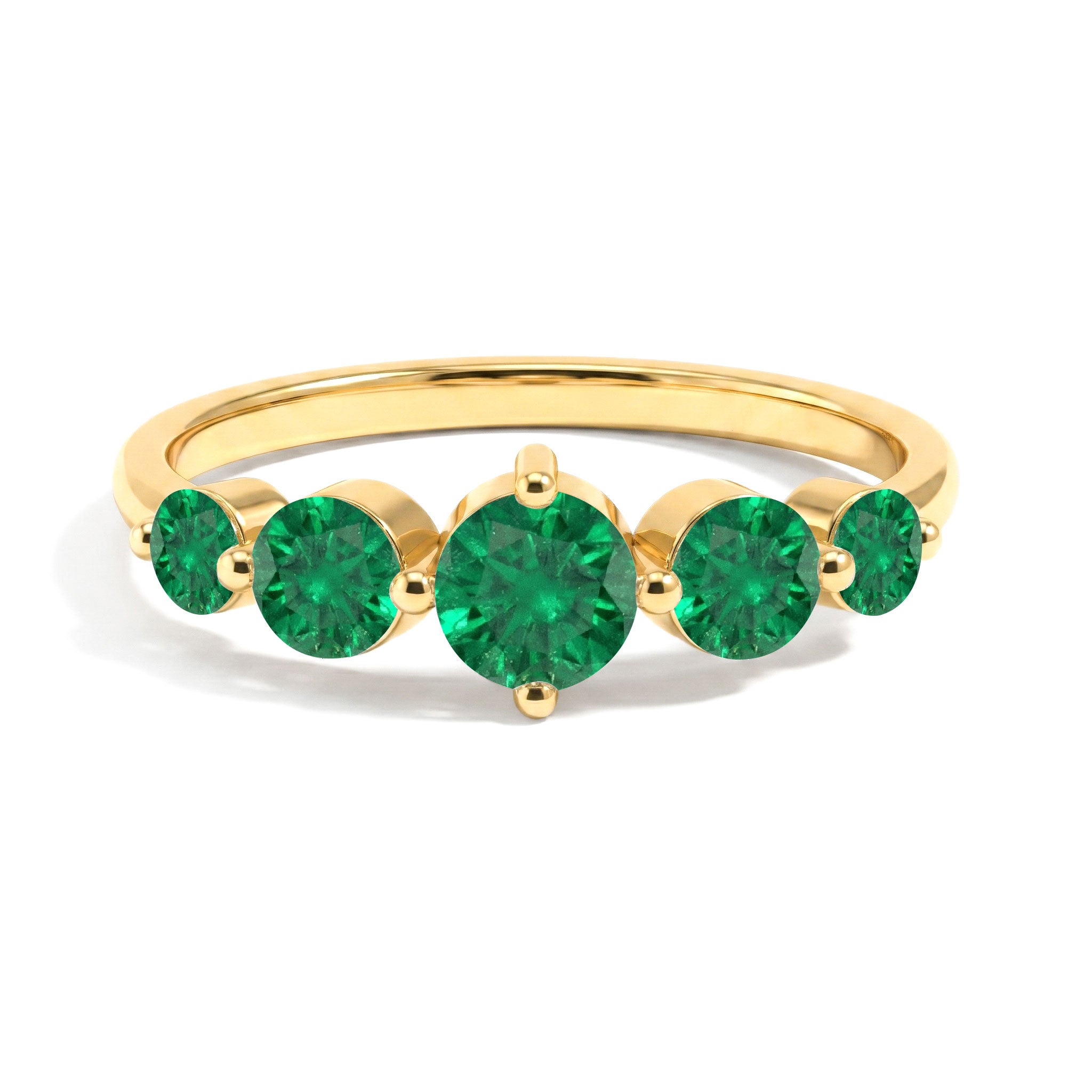 Emerald fine jewelry ring, graduated five stone band, sterling silver emerald accessory, yellow gold filled elegant band, handcrafted gemstone masterpiece, polished luxury jewelry, vibrant round emerald stones, women's stacking accessory, anniversary celebration jewelry, refined bridal fashion, premium gemstone craftsmanship, everyday elegant ring, timeless emerald gift, sophisticated design, classic jewelry collection