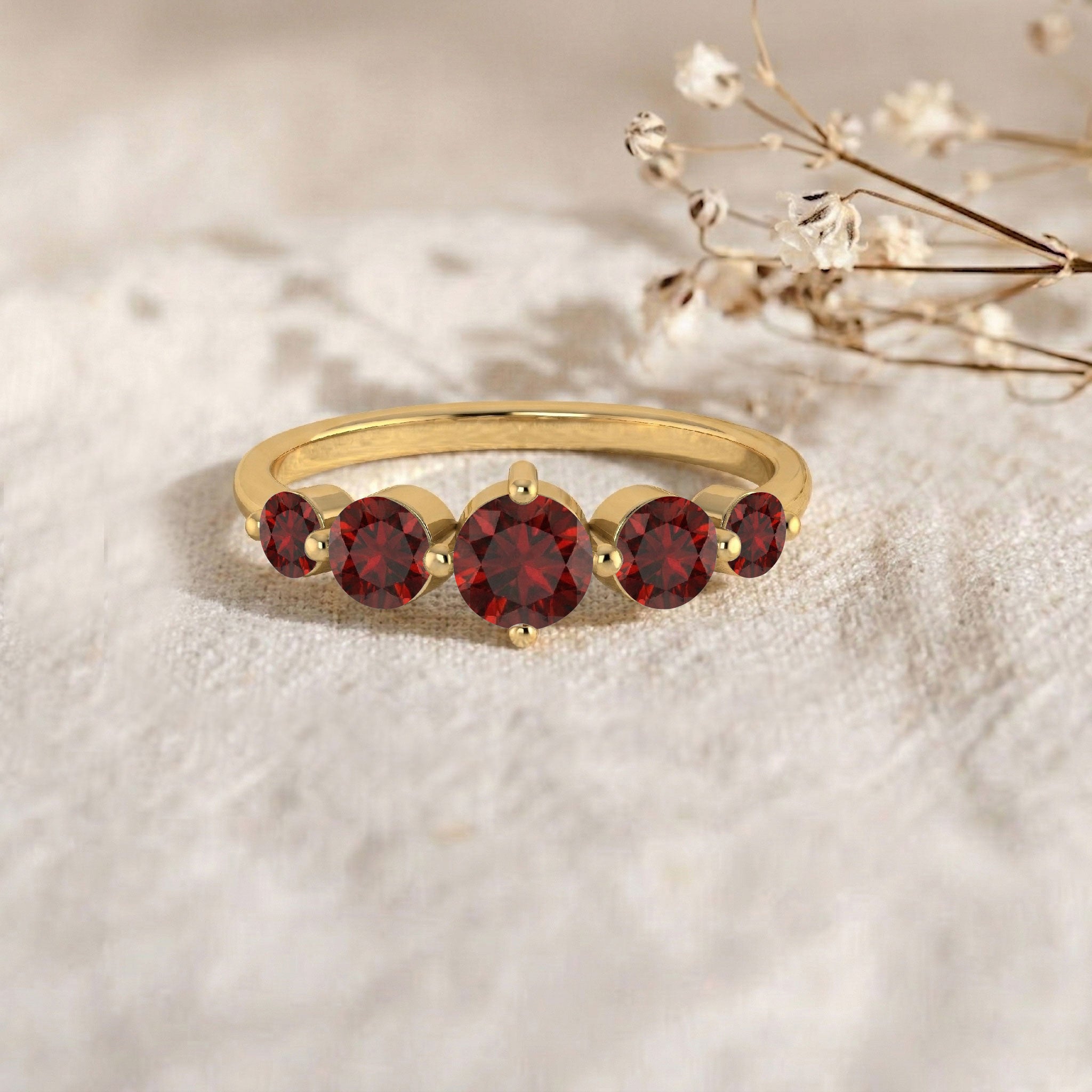 graduated garnet wedding band, brilliant garnet gemstones, prong set ring, sterling silver stacking jewelry, yellow gold filled jewelry, elegant bridal ring, red gemstone fashion ring, artisan crafted jewelry, everyday luxury accessory, fine gemstone band, contemporary women's jewelry, classic garnet design, anniversary keepsake, statement stacking ring, premium jewelry