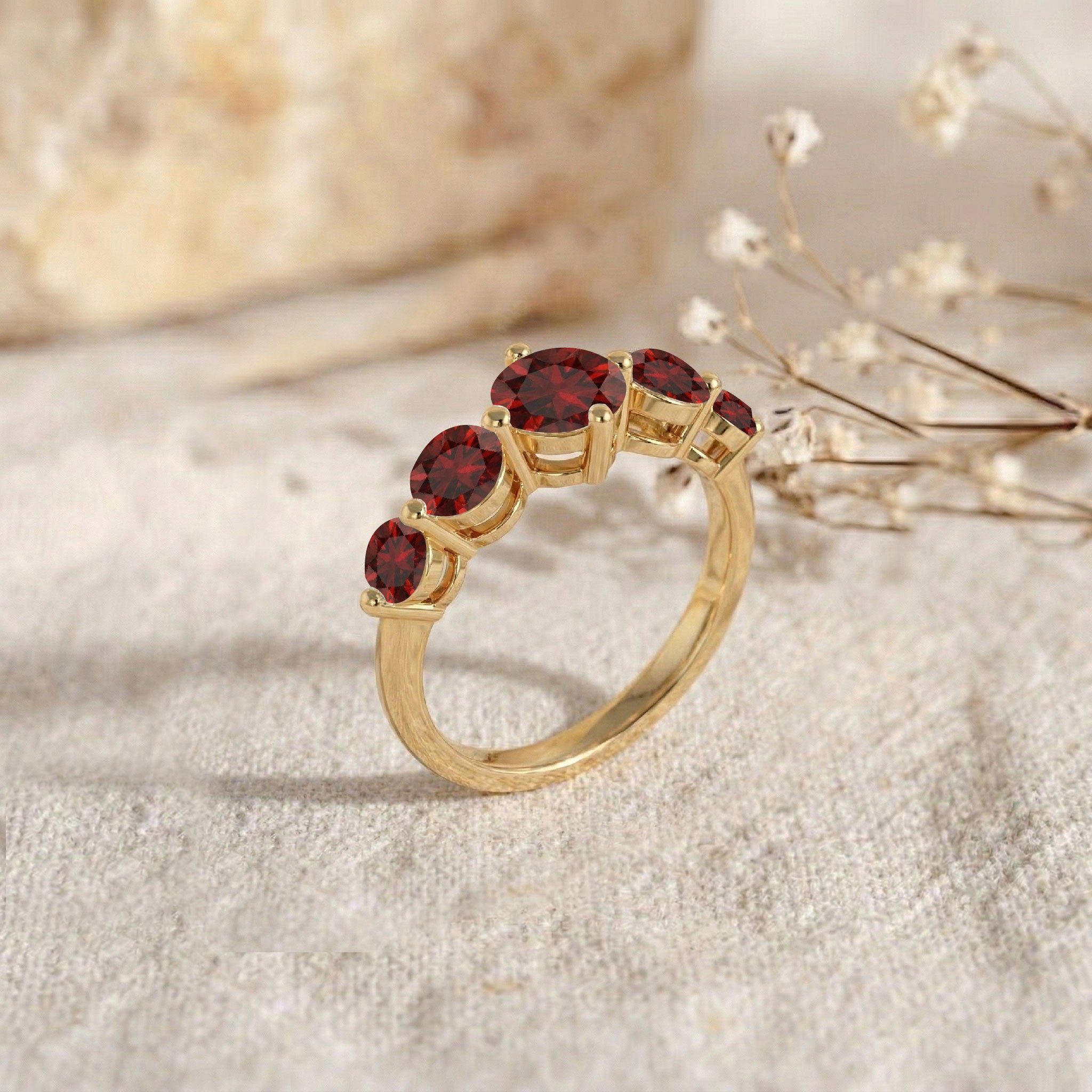 luxury garnet jewelry, graduated round gemstone ring, polished sterling silver accessory, gold filled gemstone band, elegant women's fashion ring, handcrafted anniversary jewelry, stackable fine ring, vibrant garnet brilliance, modern bridal design, sophisticated everyday accessory, classic red gemstone, premium craftsmanship, delicate luxury band, timeless jewelry gift, refined style