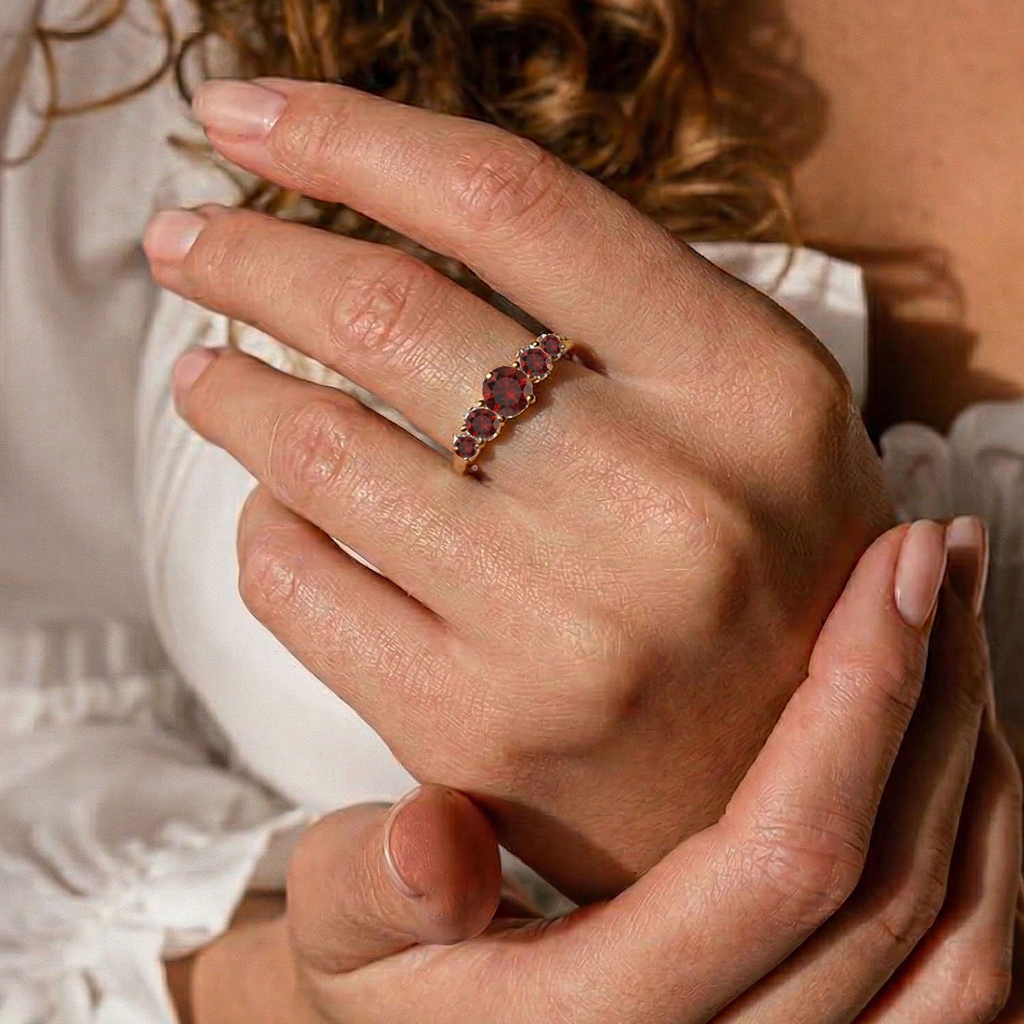 deep red garnet ring, five gemstone band, round cut garnet jewelry, classic anniversary ring, bridal stacking ring, dainty garnet band, women's fine jewelry, elegant gemstone accessory, modern ring design, polished silver jewelry, gold filled band, January birthday gift, sophisticated fashion jewelry, timeless ring style, handcrafted craftsmanship