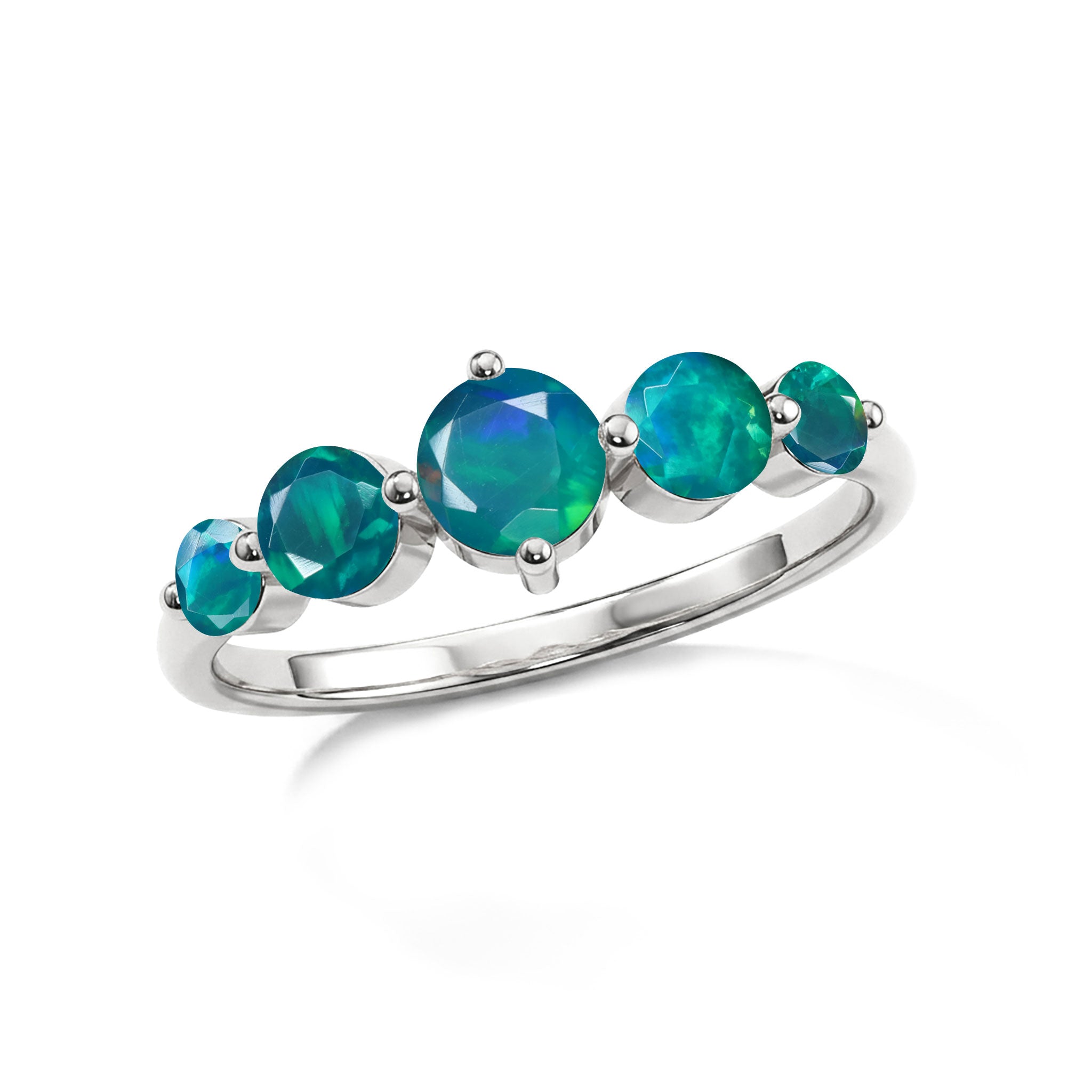 elegant green gemstone ring, artisan silver jewelry, gold filled craftsmanship, five stone jewelry, handcrafted gemstone design, polished finish, luxury accessory, anniversary celebration, birthday keepsake, bridal elegance, timeless fashion, sophisticated jewelry, fine gemstone ring, everyday luxury, premium jewelry, unique craftsmanship, women's gift, stackable style, modern elegance, classic jewelry
