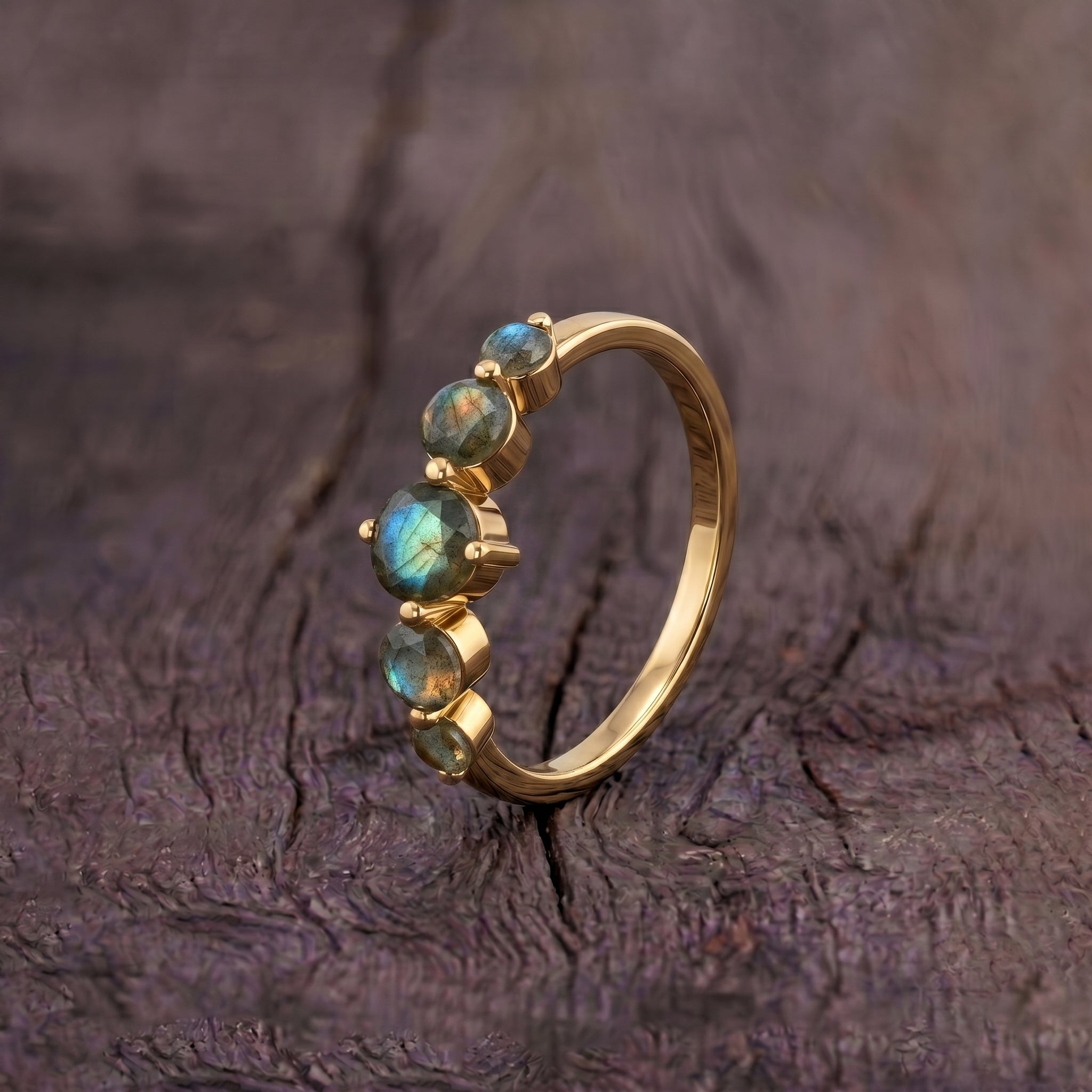 genuine labradorite five stone jewelry, handcrafted gemstone ring, natural blue flash gemstone band, elegant silver fashion ring, yellow gold filled craftsmanship, luxury stacking jewelry, faceted round stones, contemporary artisan ring, women's premium accessory, anniversary gift idea, timeless gemstone jewelry, polished finish band, designer ring style, everyday gemstone elegance, fine jewelry gift
