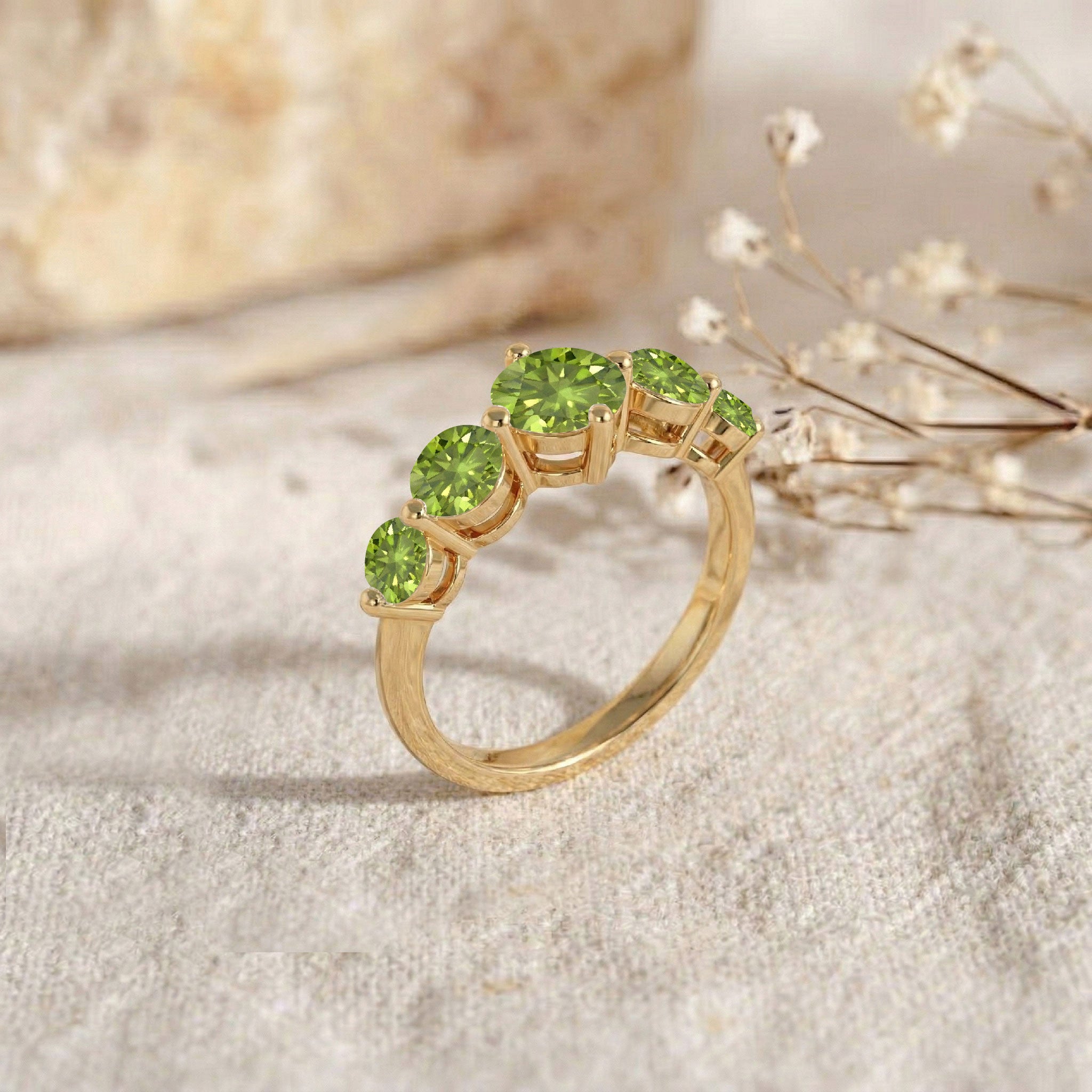 ascending gemstone crown, luxury peridot statement ring, polished sterling silver jewellery, artisan crafted gold filled band, brilliant natural gemstone sparkle, premium designer jewellery, elegant everyday styling, women's fine accessory, handcrafted ring artistry, contemporary gemstone fashion, refined craftsmanship, modern jewellery collection, timeless gift, unique band profile, colourful sophistication