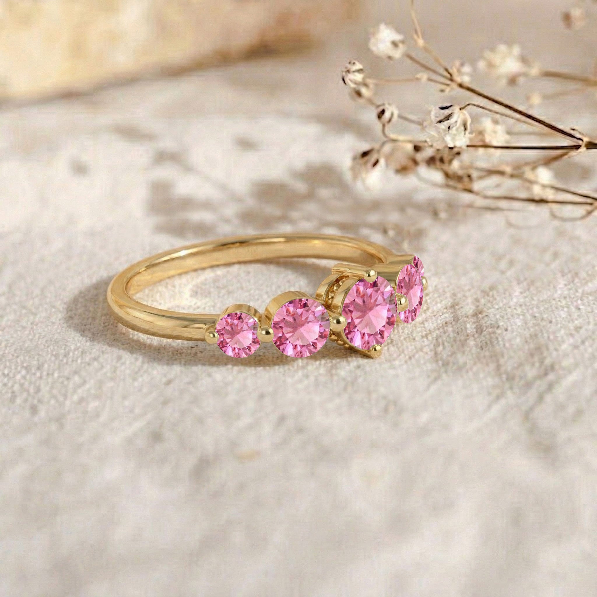 round pink gemstones, graduated gemstone band, handcrafted artisan ring, sterling silver luxury, yellow gold filled elegance, premium jewellery design, polished comfort band, elegant women's accessory, anniversary jewellery, refined craftsmanship, modern fashion ring, colourful gemstone sparkle, timeless jewellery, exclusive collection, luxury accessory