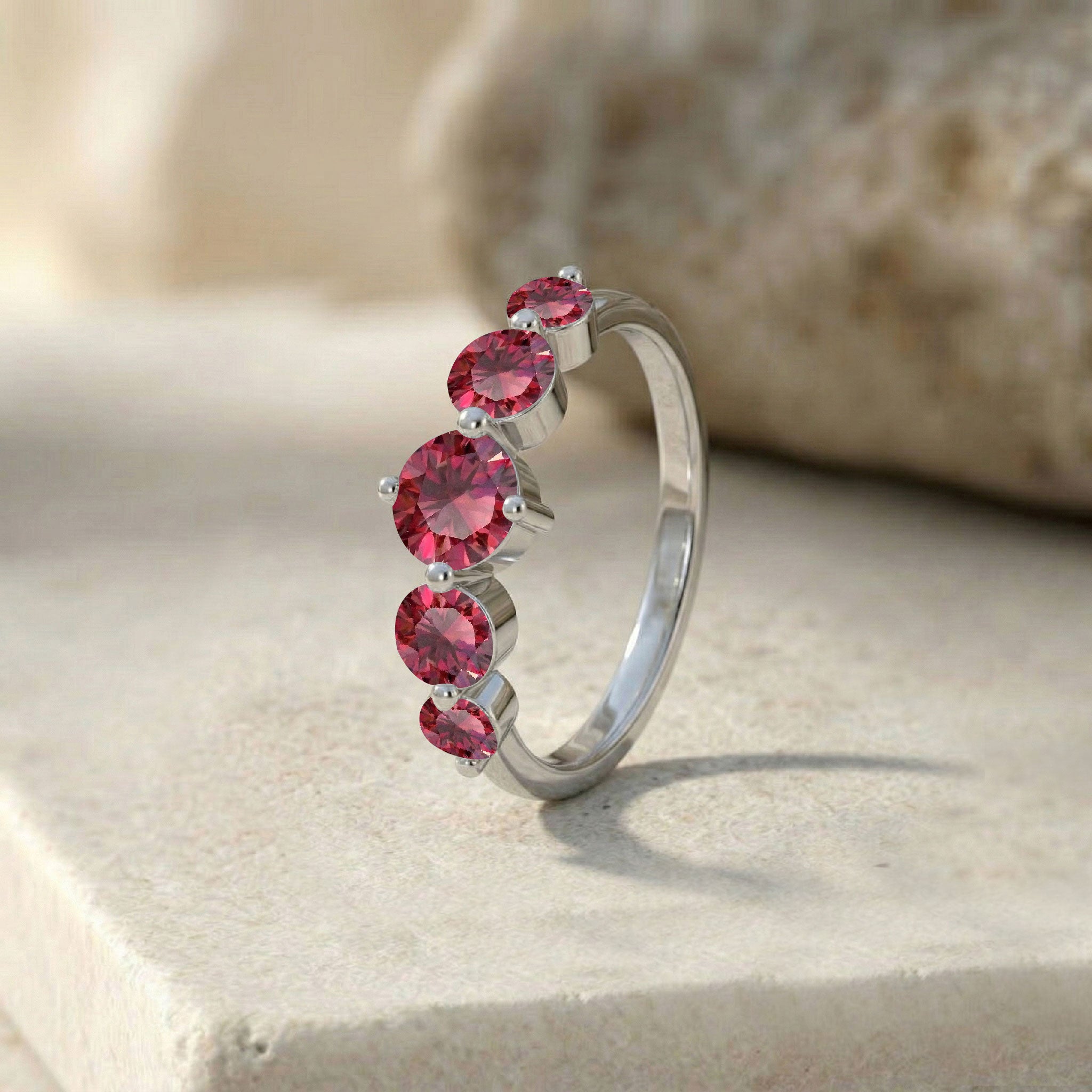 five gemstone ruby band, handcrafted polished jewellery, sterling silver luxury ring, gold filled jewellery design, vibrant crimson gemstones, artisan craftsmanship, premium fashion jewellery, elegant women's ring, anniversary jewellery, comfortable band profile, refined gemstone setting, timeless collection, luxury accessory, handcrafted beauty, fine jewellery