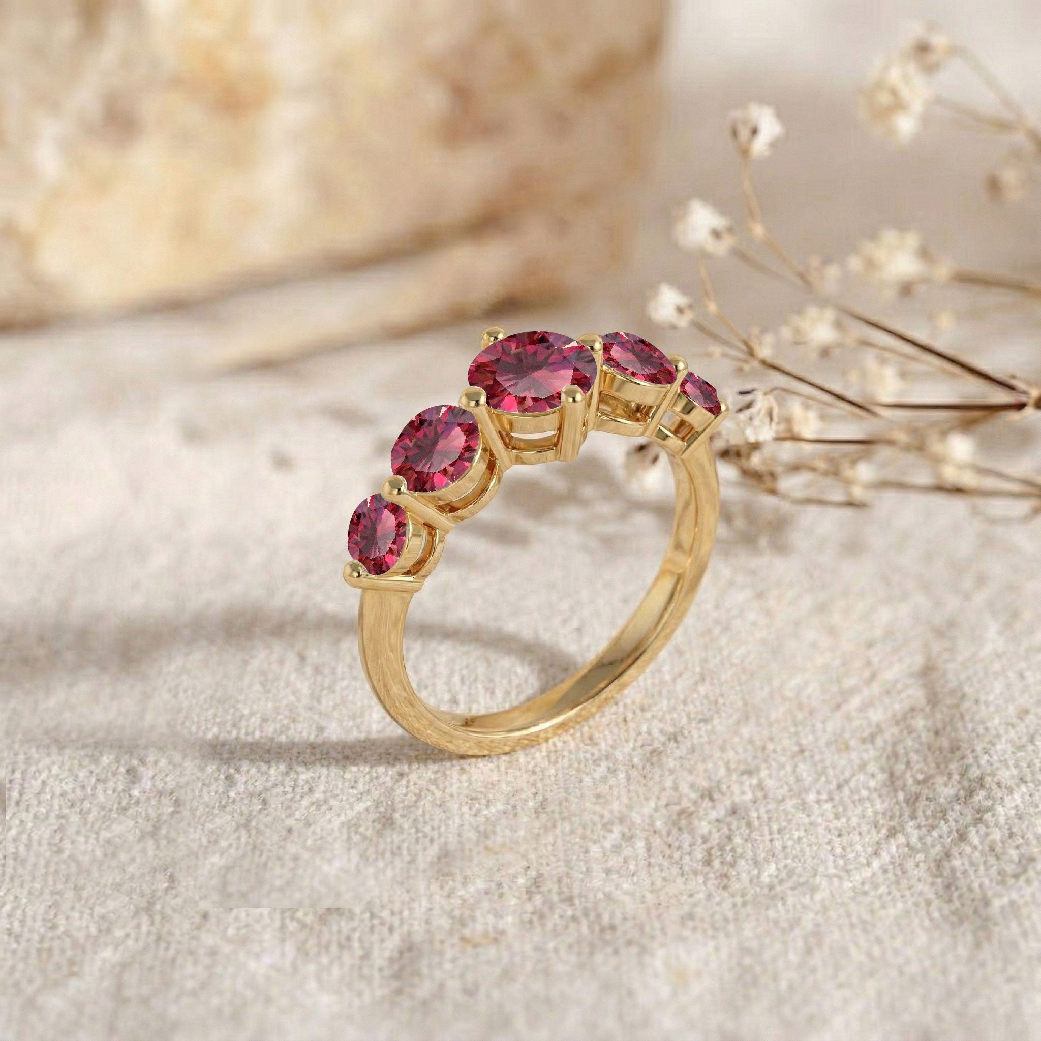 classic ruby jewellery, natural gemstone band, handcrafted sterling silver ring, polished gold filled finish, brilliant round ruby stones, artisan luxury craftsmanship, elegant stacking accessory, women's statement jewellery, July birthstone elegance, premium ring design, sophisticated fashion accessory, timeless jewellery, refined gemstone artistry, luxury gift, exclusive ring