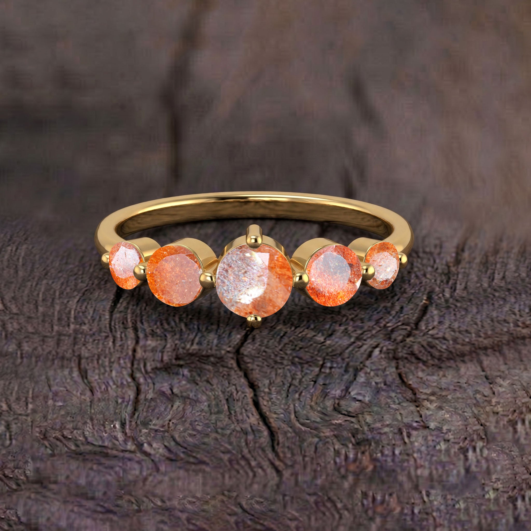 five round sunstone gemstones, natural orange gemstone, handcrafted silver jewelry, yellow gold filled finish, elegant jewelry design, fine jewelry gift, romantic anniversary jewelry, sparkling gemstone setting, polished craftsmanship, women's luxury jewelry, classic jewelry style, refined elegance, fashion accessory, artisan jewelry, everyday elegance
