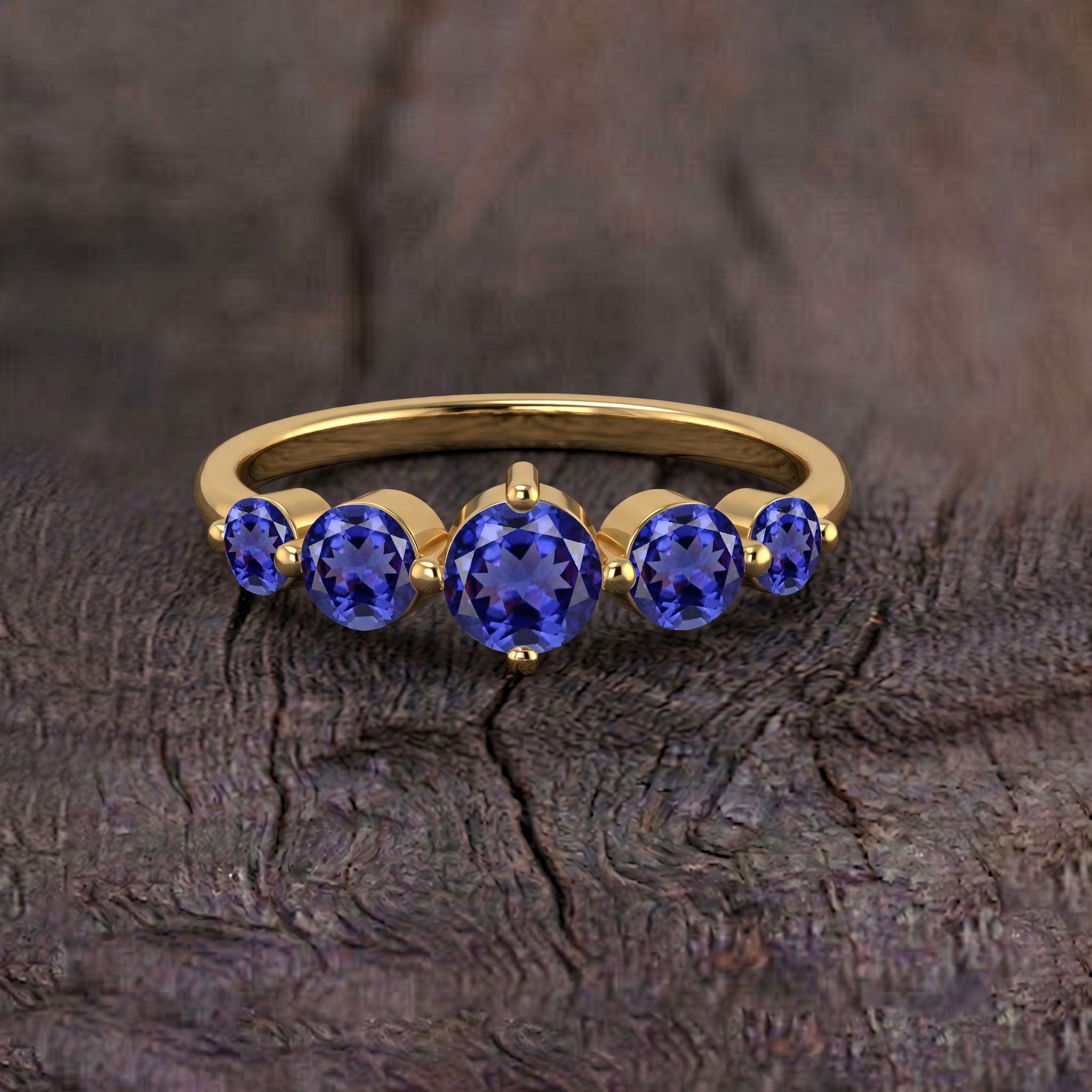 round tanzanite jewelry, handcrafted sterling silver craftsmanship, yellow gold filled elegant finish, five gemstone arrangement, violet gemstone ring, anniversary jewelry, engagement jewelry, sophisticated accessory, polished prong setting, artisan quality, timeless jewelry, women's luxury accessory, premium gemstone jewelry, classic design, meaningful keepsake