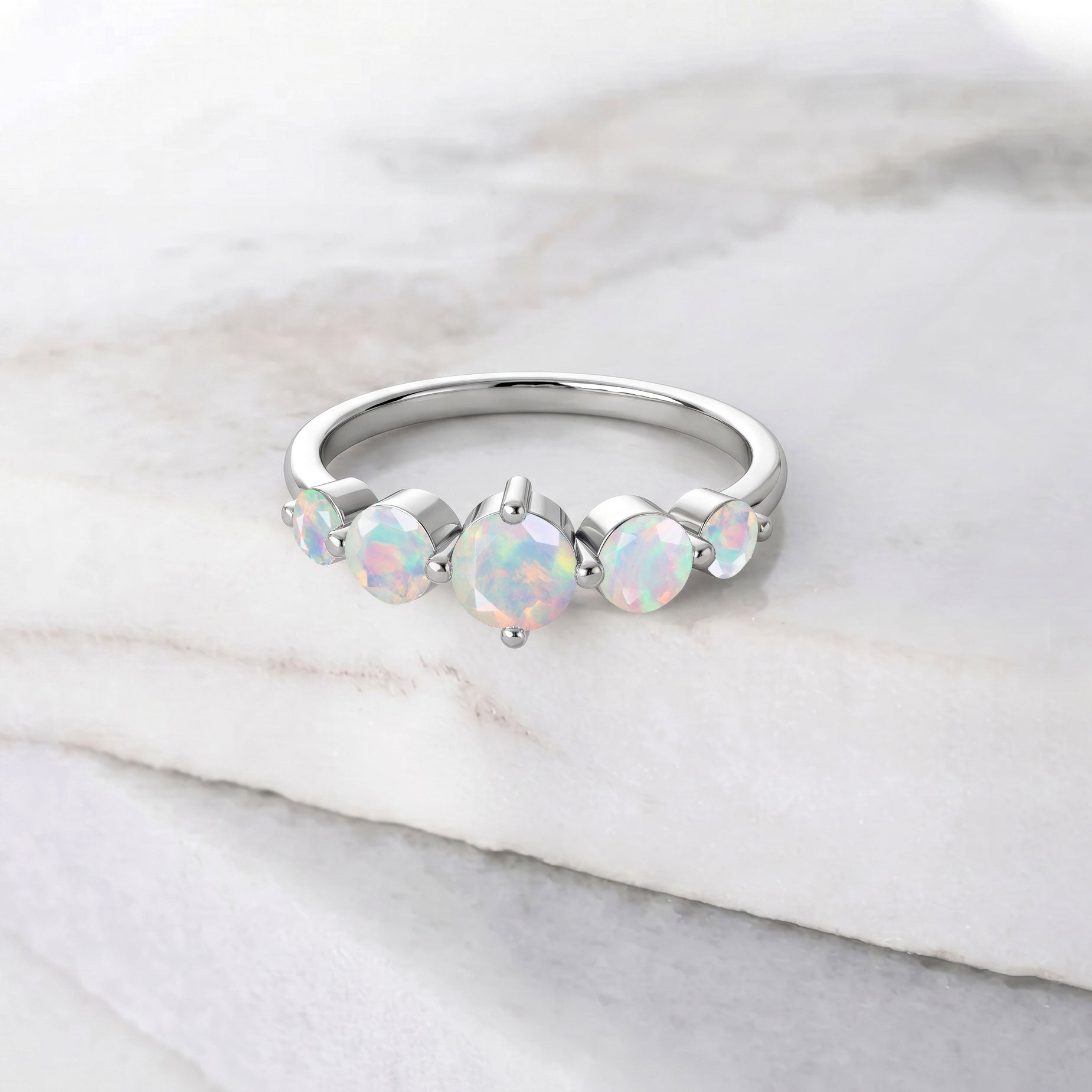 white opal gemstone jewelry, october celebration gift, elegant five stone setting, sterling silver craftsmanship, yellow gold filled finish, bridal fashion jewelry, timeless accessory, artisan gemstone work, colorful reflections, sophisticated ring, anniversary keepsake, everyday luxury, handcrafted elegance, premium jewelry gift, birthday present, women's fine jewelry, unique gemstone design, graceful jewelry, polished finish, classic accessory