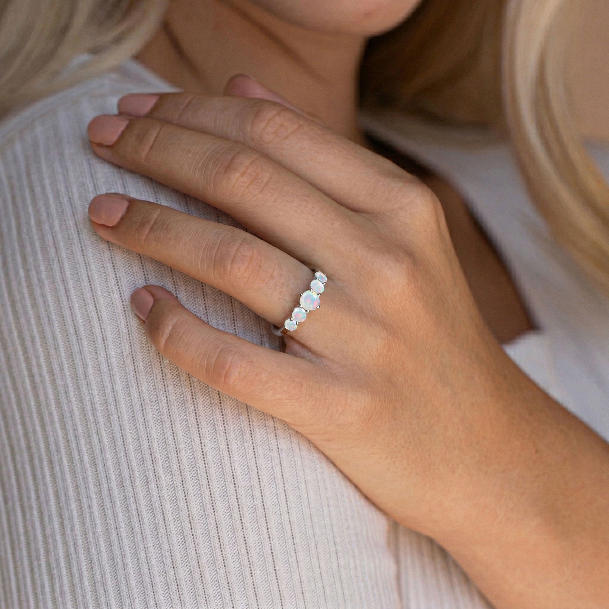 natural white opal gemstone, rainbow fire jewelry, october jewelry gift, polished gemstone ring, handcrafted silver jewelry, luxury gold jewelry, bridal elegance, promise jewelry, anniversary ring style, feminine accessory, premium gemstone craftsmanship, classic fashion, stackable jewelry, elegant everyday ring, heirloom inspired jewelry, sparkling opal, artisan design, fine accessory, luxury gift idea, sophisticated jewelry