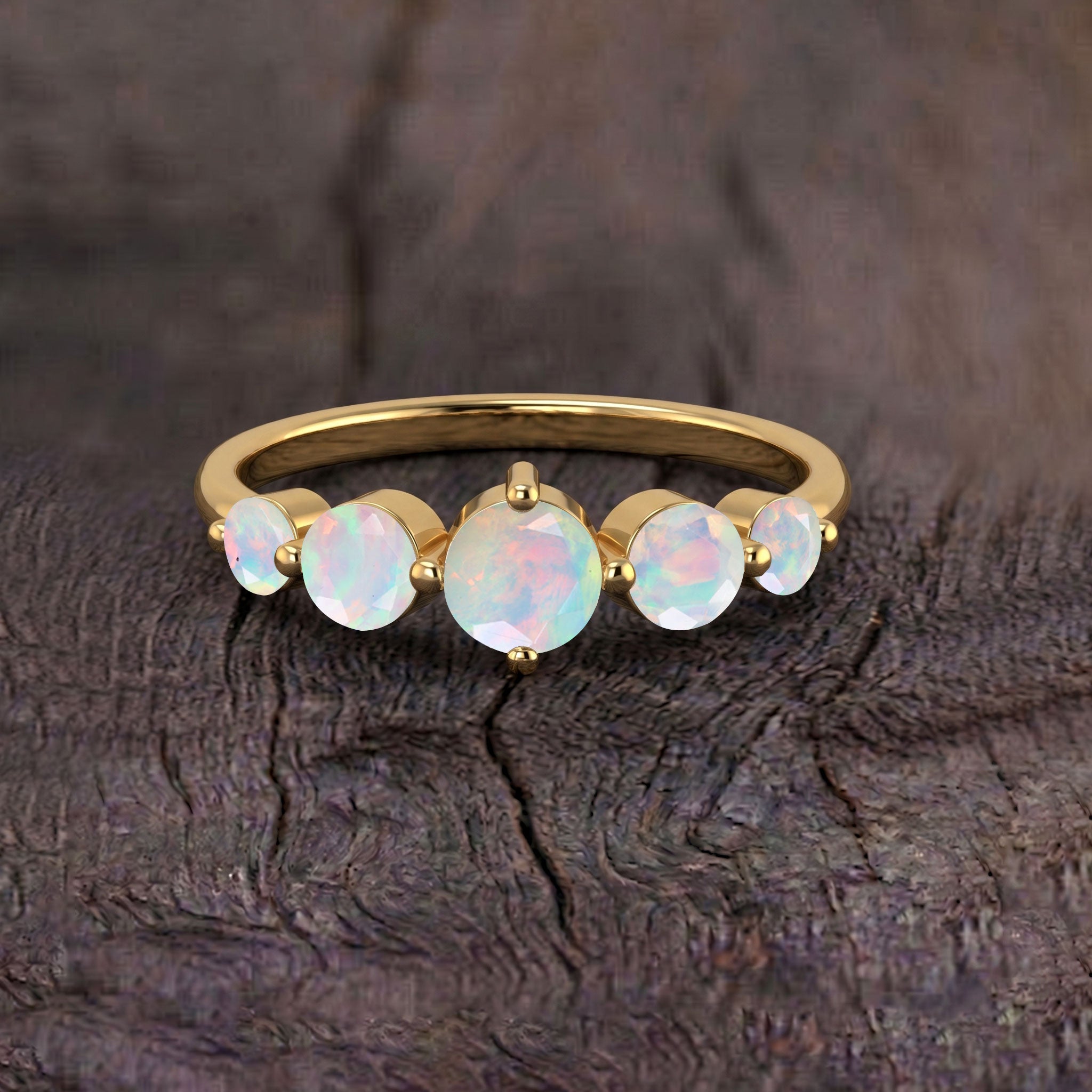 natural opal jewelry, october birthstone gift, white rainbow gemstone, graduated round stones, fine silver jewelry, yellow gold filled jewelry, luxury ring design, sophisticated style, everyday jewelry, handmade craftsmanship, classic gemstone ring, gift for mom, birthday jewelry, heirloom inspired, modern elegance, colorful reflections, sparkling gemstone, premium finish, bridal gift, fashion accessory