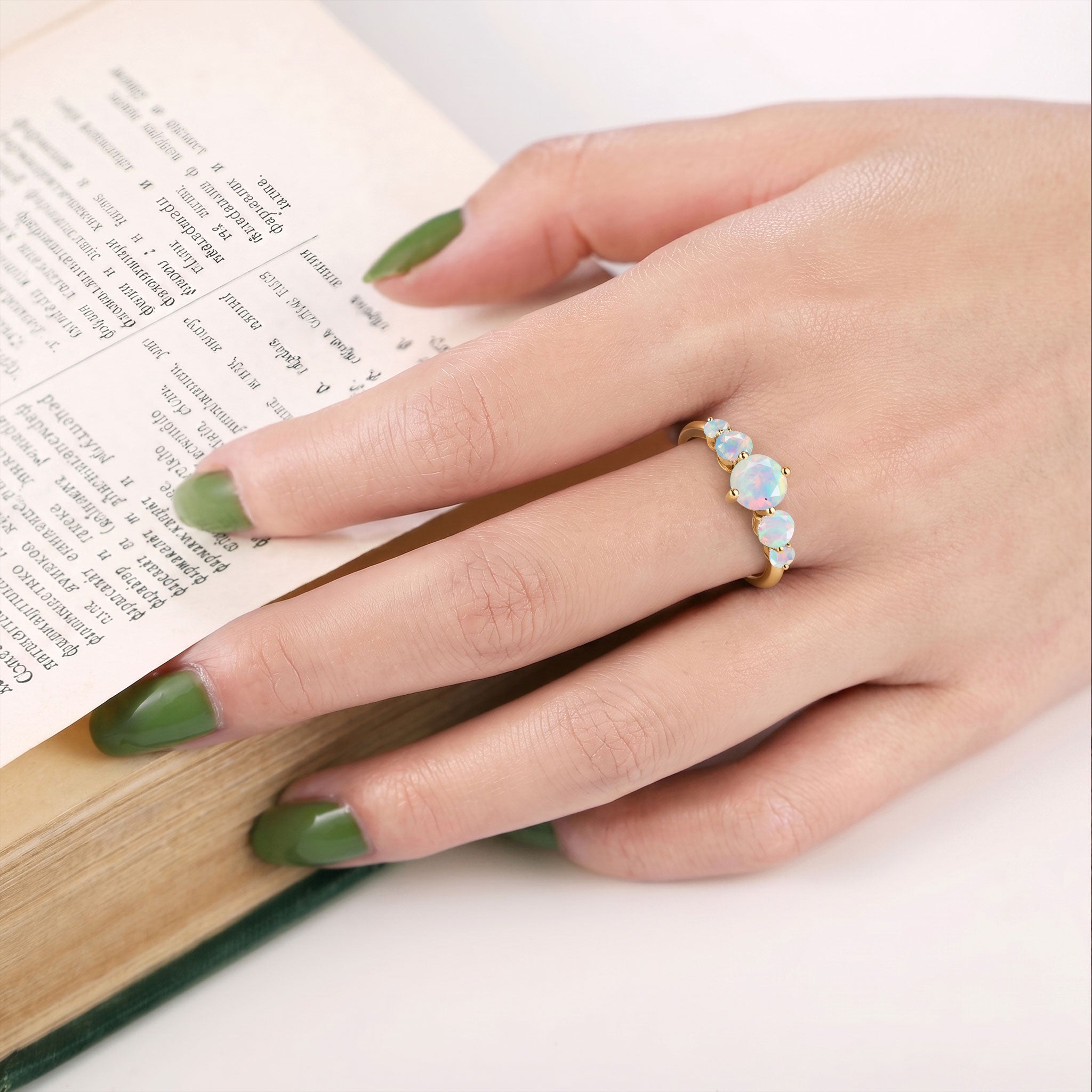 white opal jewelry gift, october gemstone ring, elegant five stone jewelry, artisan silver craftsmanship, polished gold filled finish, rainbow play color, modern bridal jewelry, anniversary surprise, birthday present, promise jewelry, luxury accessory, feminine elegance, timeless keepsake, handcrafted gemstone jewelry, fashion ring, sophisticated accessory, unique jewelry gift, premium design, heirloom style, classic luxury