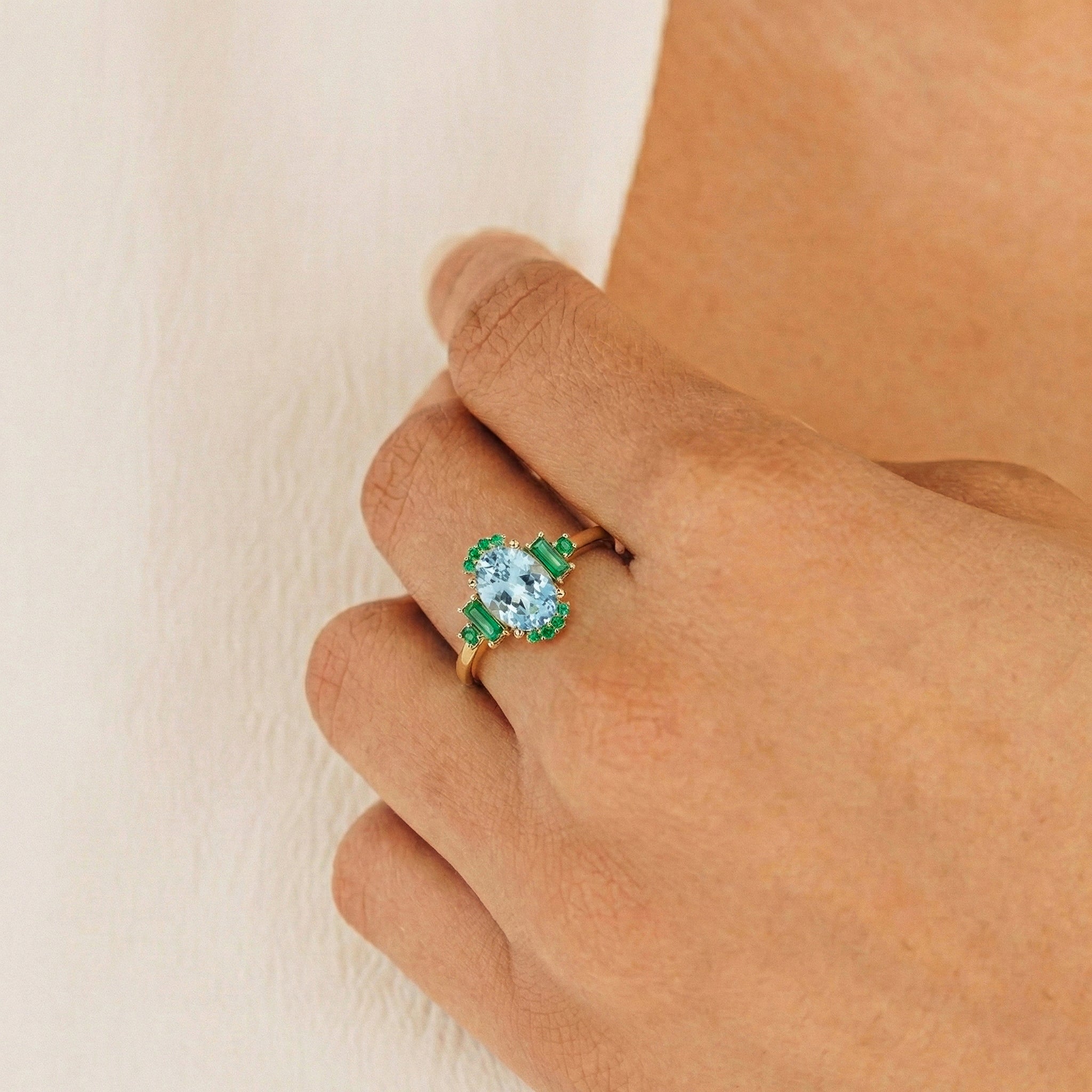 natural aquamarine engagement ring with green emerald accents