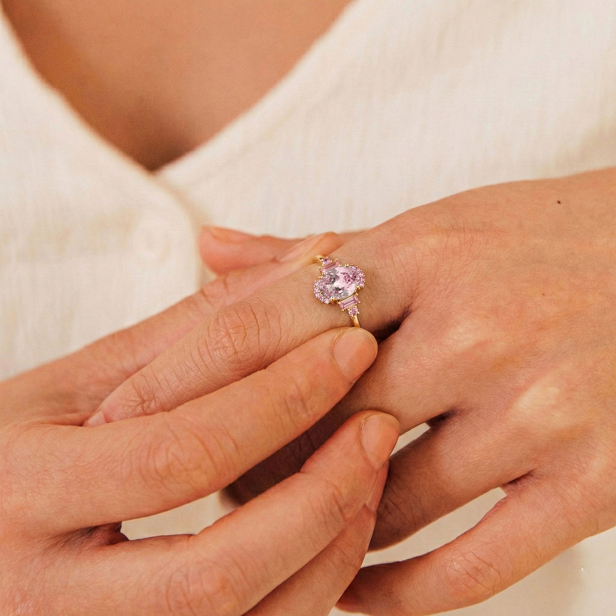 Close up pink tourmaline gemstone engagement ring in 925 sterling silver