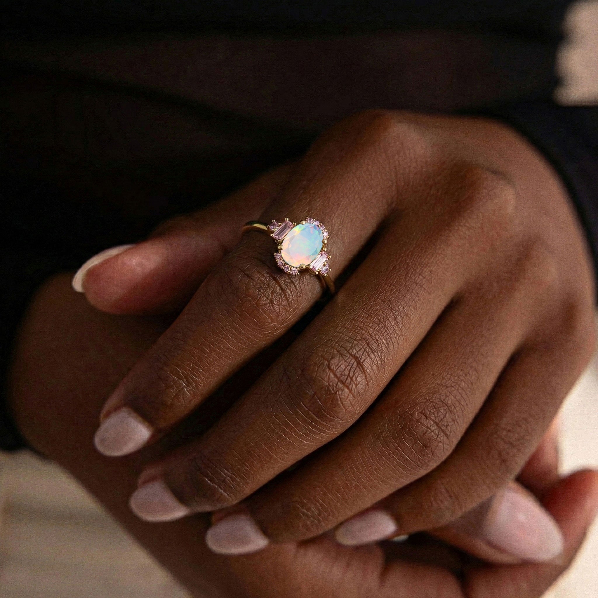 Close up white opal and pink tourmaline ring in 925 sterling silver with rose gold filled accents
