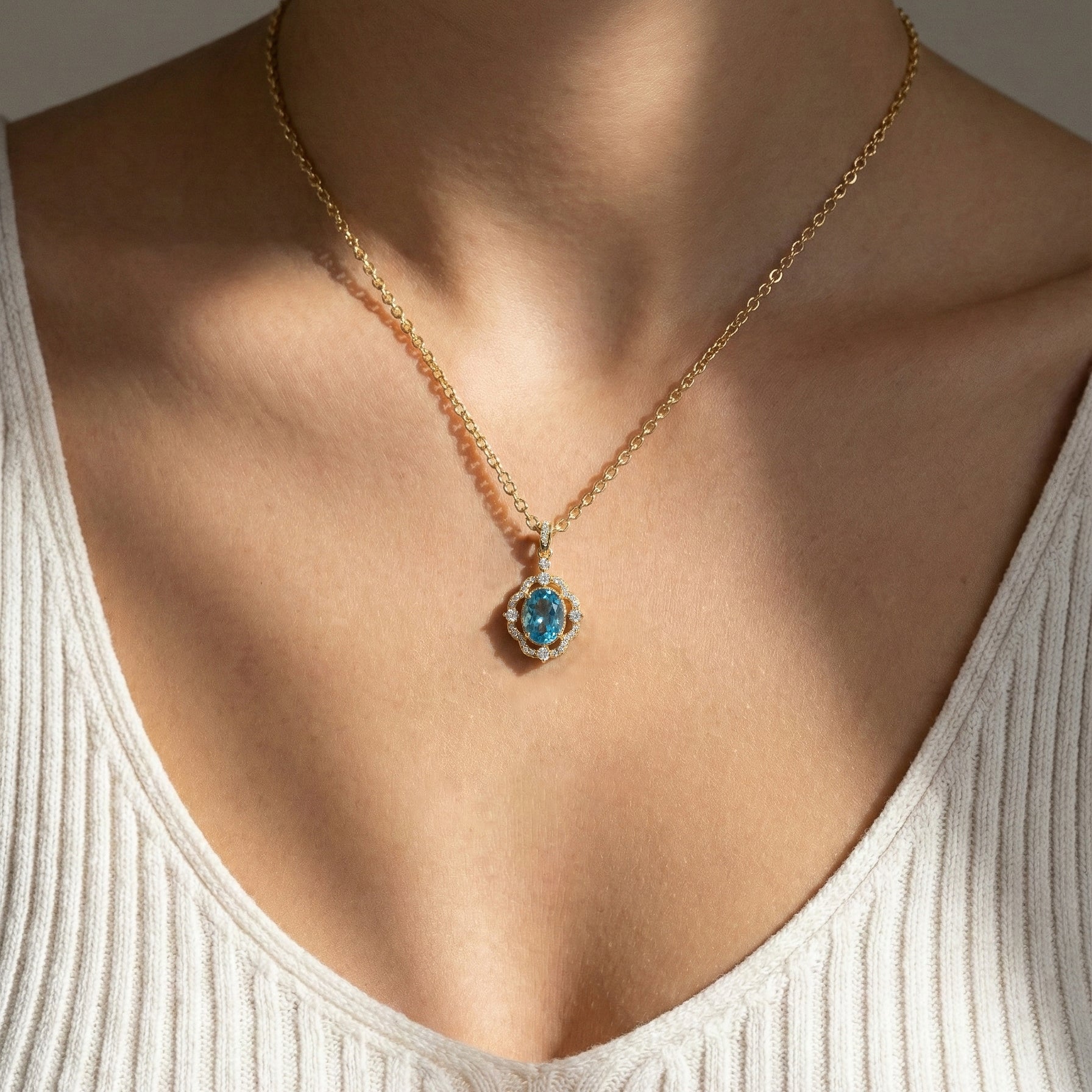 Blue Topaz Oval Halo Pendant Necklace in Yellow Gold Plated 1.2ct