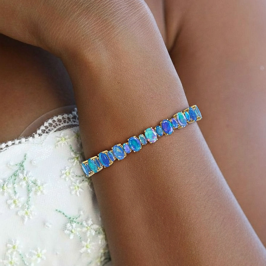 Blue Opal Oval Tennis Bracelet in 925 Sterling Silver 7x5 MM 34.50ct