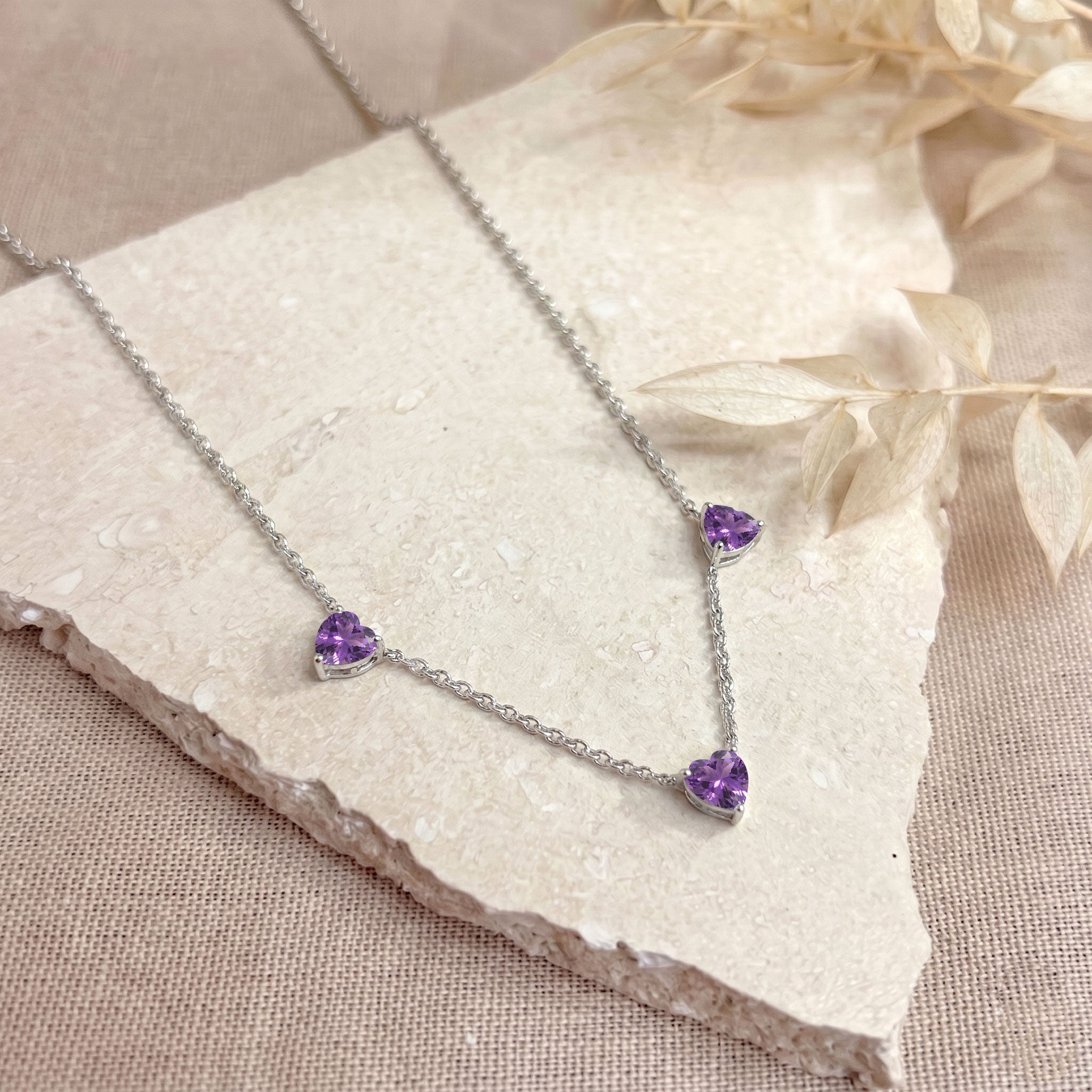 Elegant AAA Grade Amethyst Three Stone Heart Necklace for women in sterling silver.

