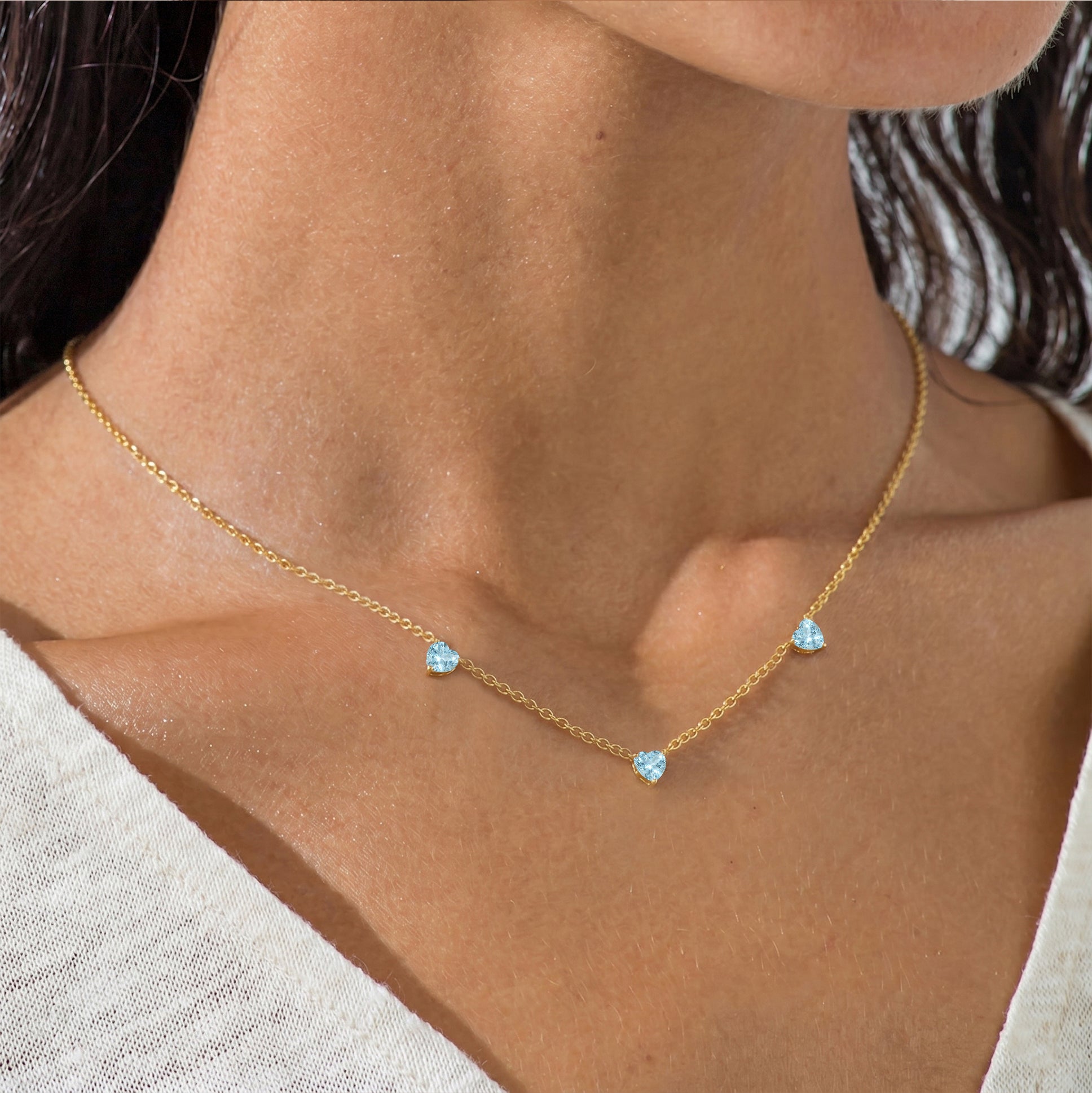 AAA Grade Aquamarine Three Stone Heart Necklace in 925 Sterling Silver with genuine 6mm heart-cut gemstones.
