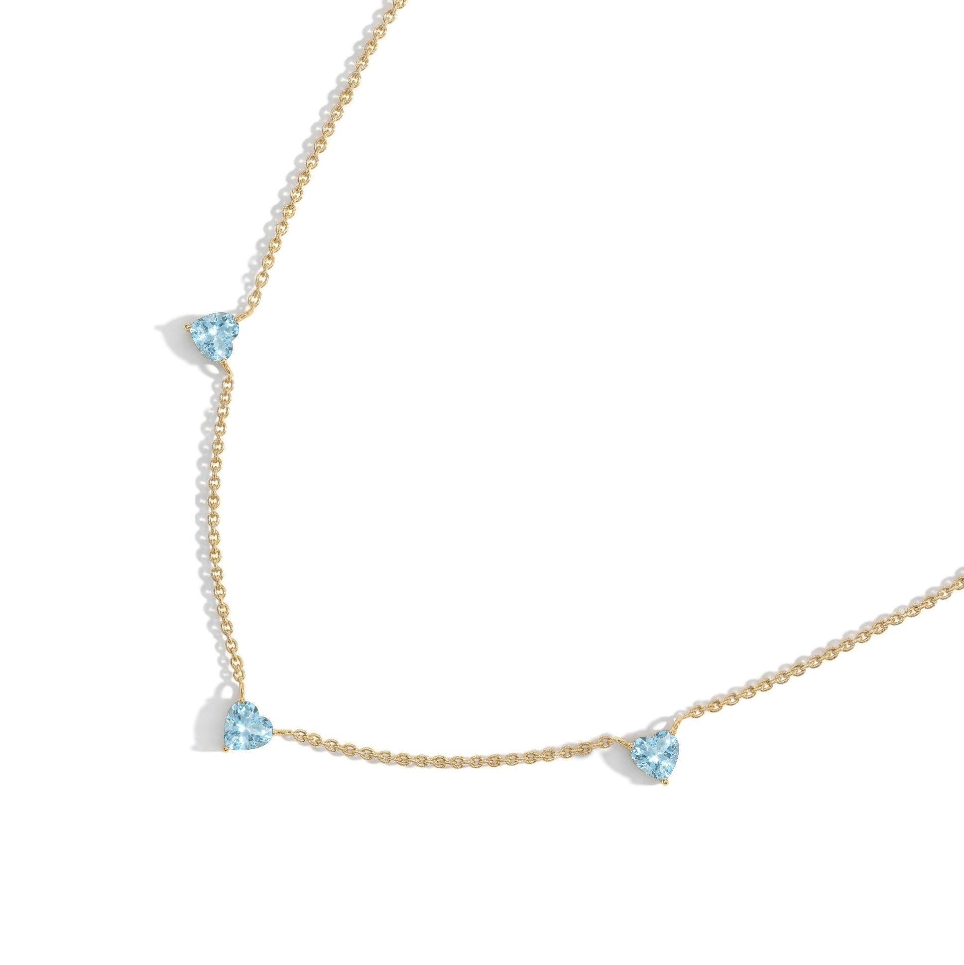 Aquamarine Three Stone Heart Necklace available in sterling silver and gold filled.

