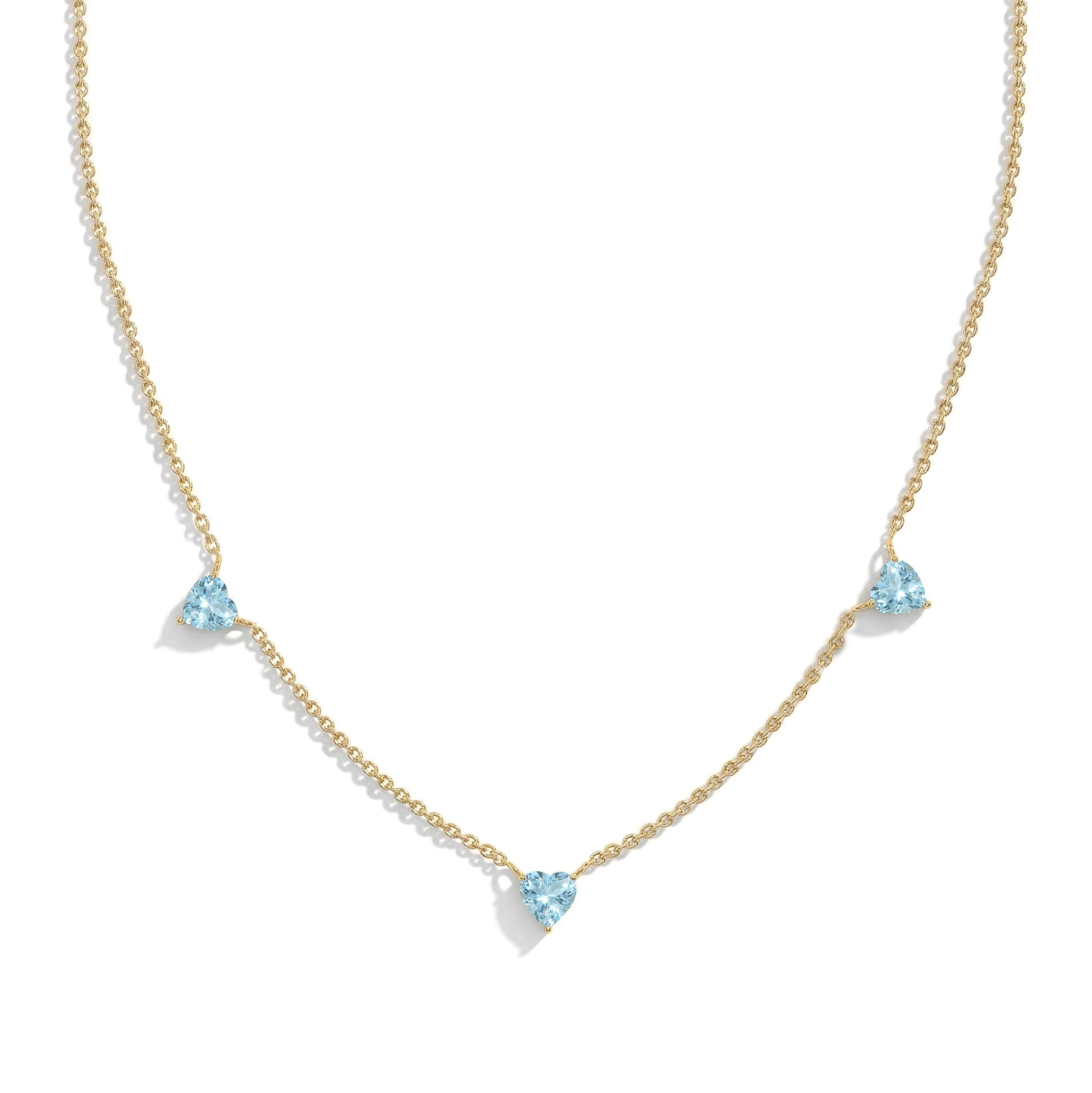 Handmade Aquamarine Three Stone Heart Necklace in yellow gold filled.
