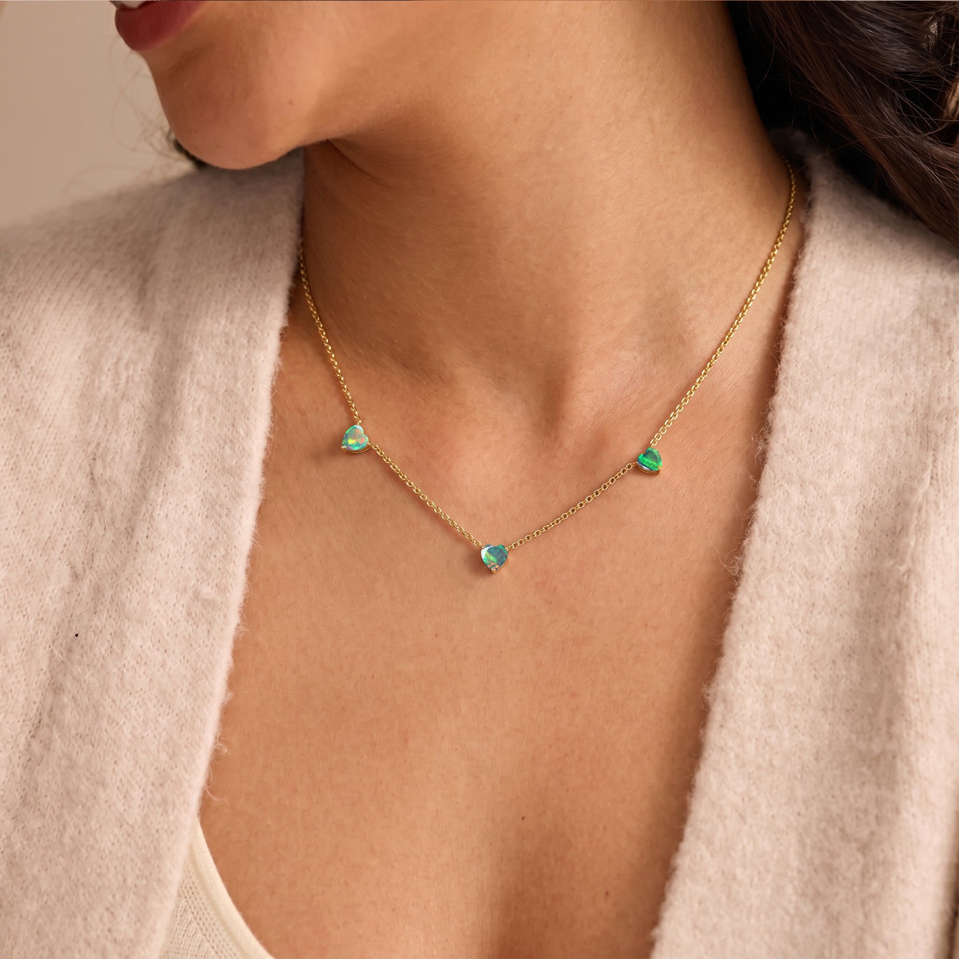 Handmade Natural Black Opal Three Stone Heart Necklace with vibrant play of color in Yellow Gold Filled.
