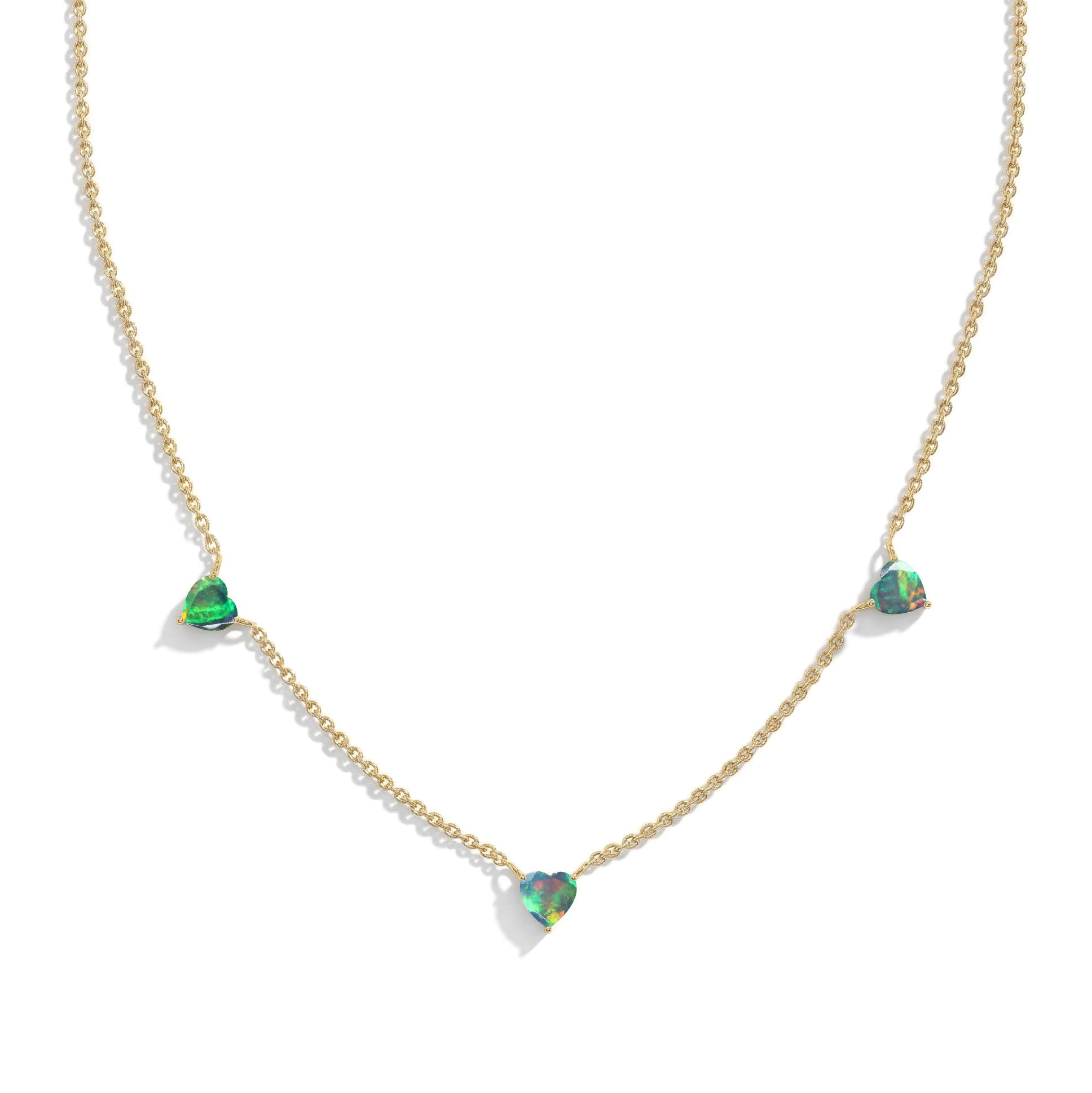 Fine jewelry Natural Black Opal necklace with three heart-shaped gemstones.

