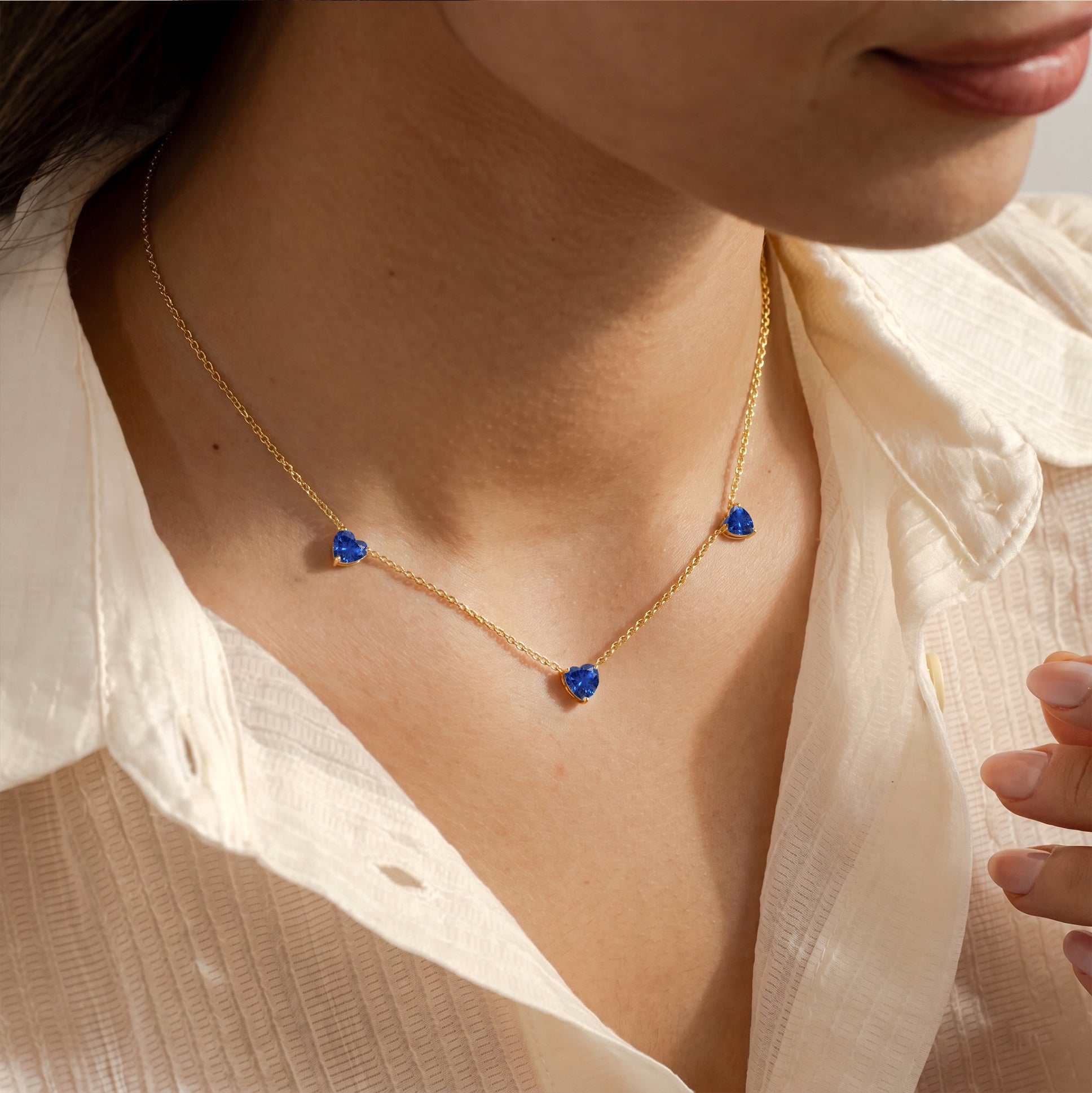AAA Blue Sapphire Three Stone Heart Necklace in 925 Sterling Silver