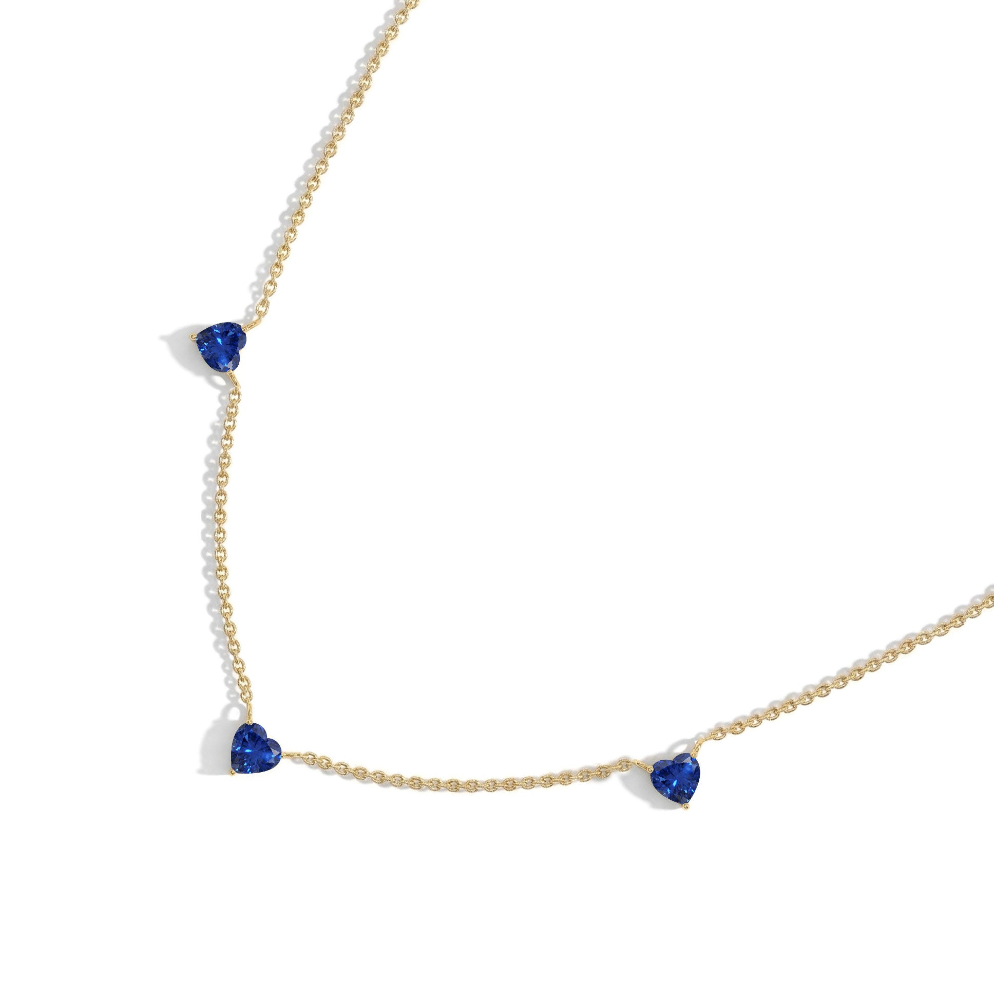 Blue Sapphire Heart Necklace on a delicate 16-inch chain for everyday wear.
