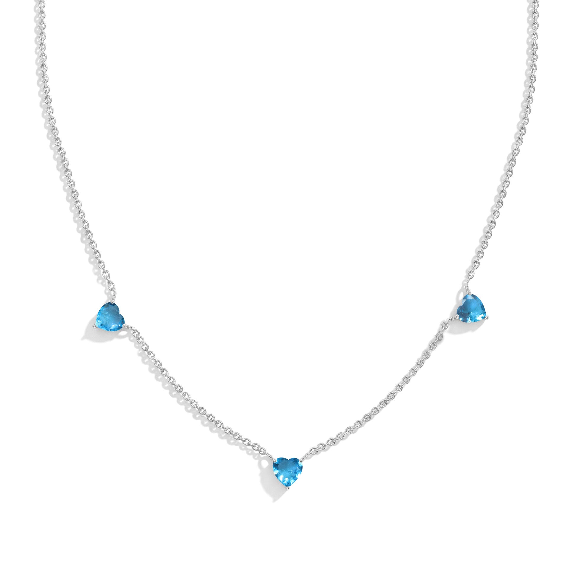 "AAA Grade Natural Blue Topaz Three Stone Heart Necklace in 925 Sterling Silver with genuine heart-cut gemstones.
