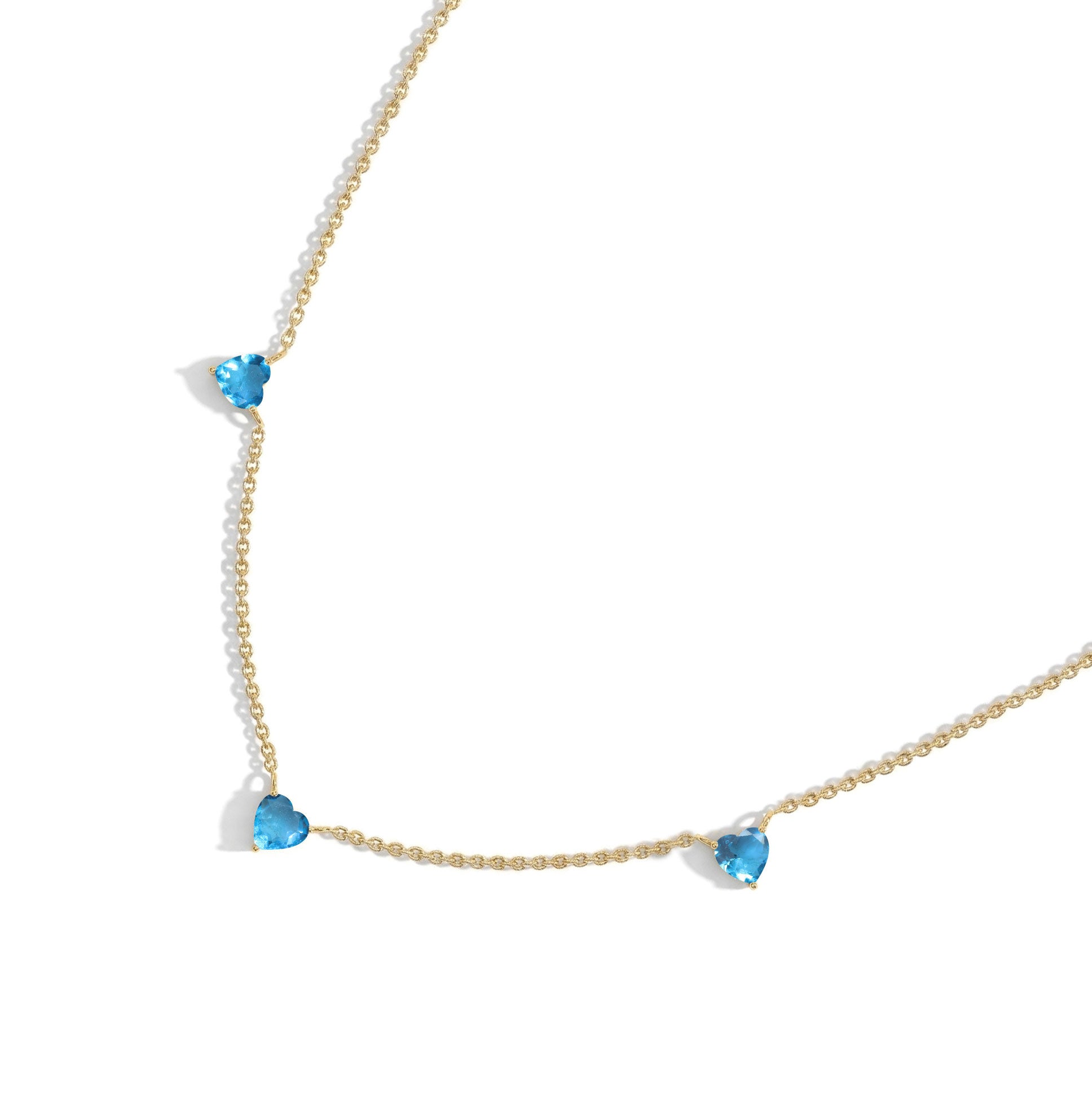 Natural Blue Topaz Heart Necklace on a delicate 16-inch chain for everyday wear.
